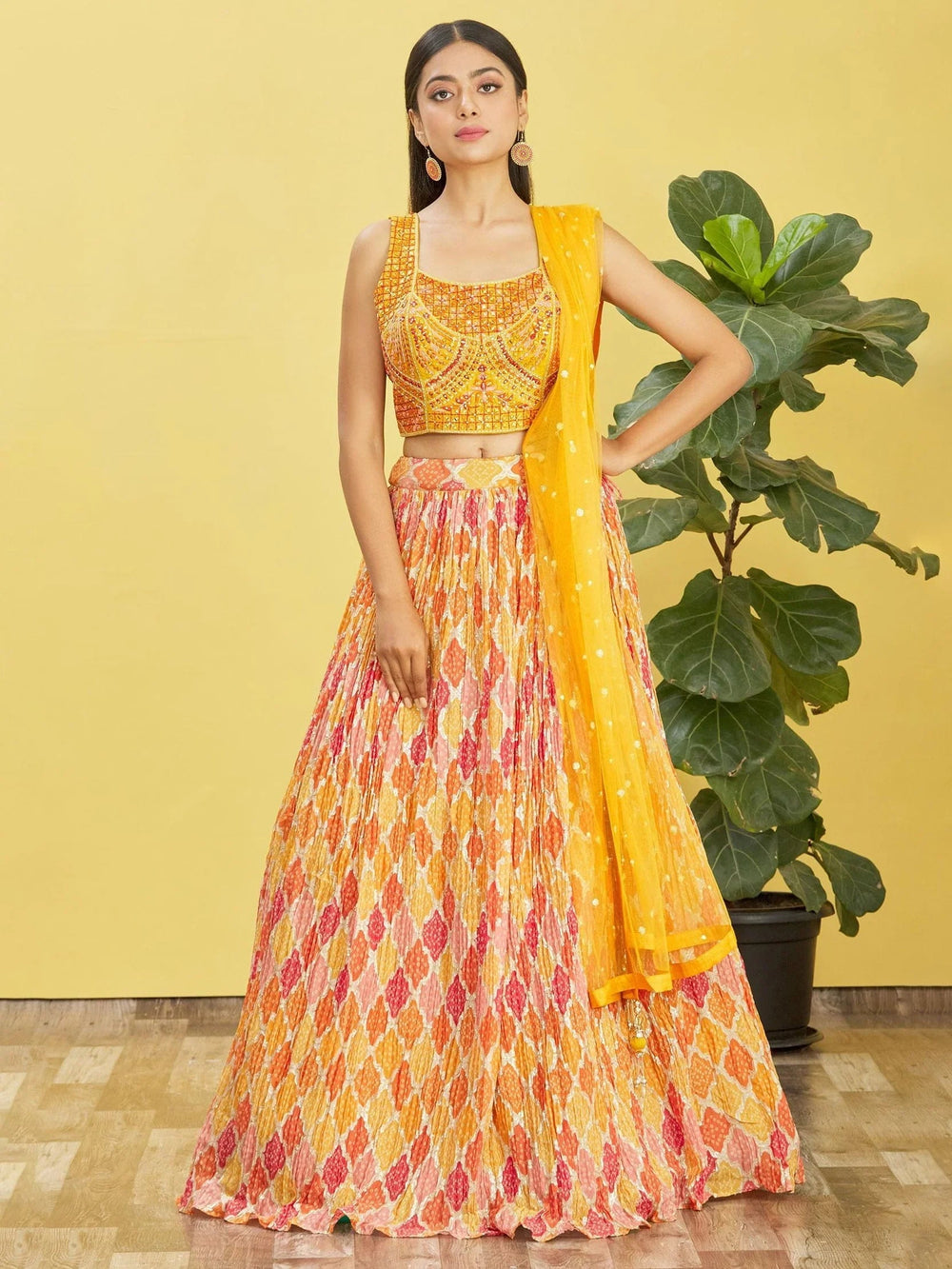 Chinon lehenga choli with mirror work and thread embroidery for haldi ceremony and festive wear