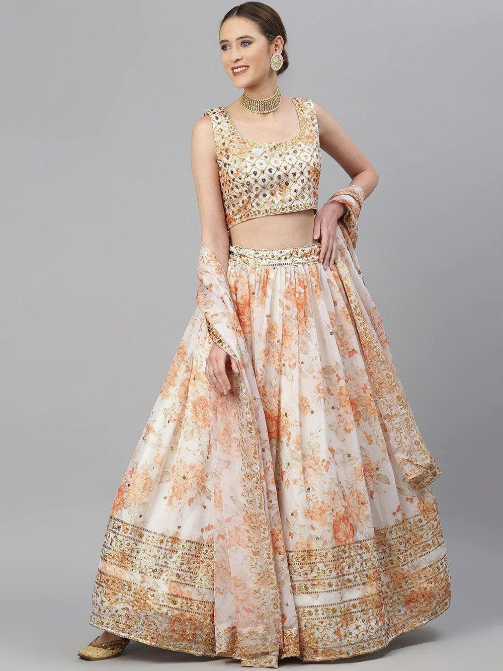 Organza lehenga choli with sequin embellishment and floral embroidery for wedding and festive wear