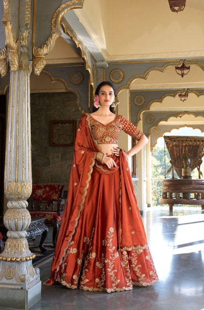 Orange Color Rangoli Silk Sequins And Thread Embroidery Work Lehenga Choli For Woman