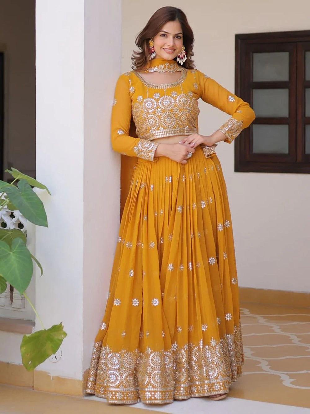 Yellow Eye-Catching Sequins Georgette Haldi Wear Lehenga Choli for Women