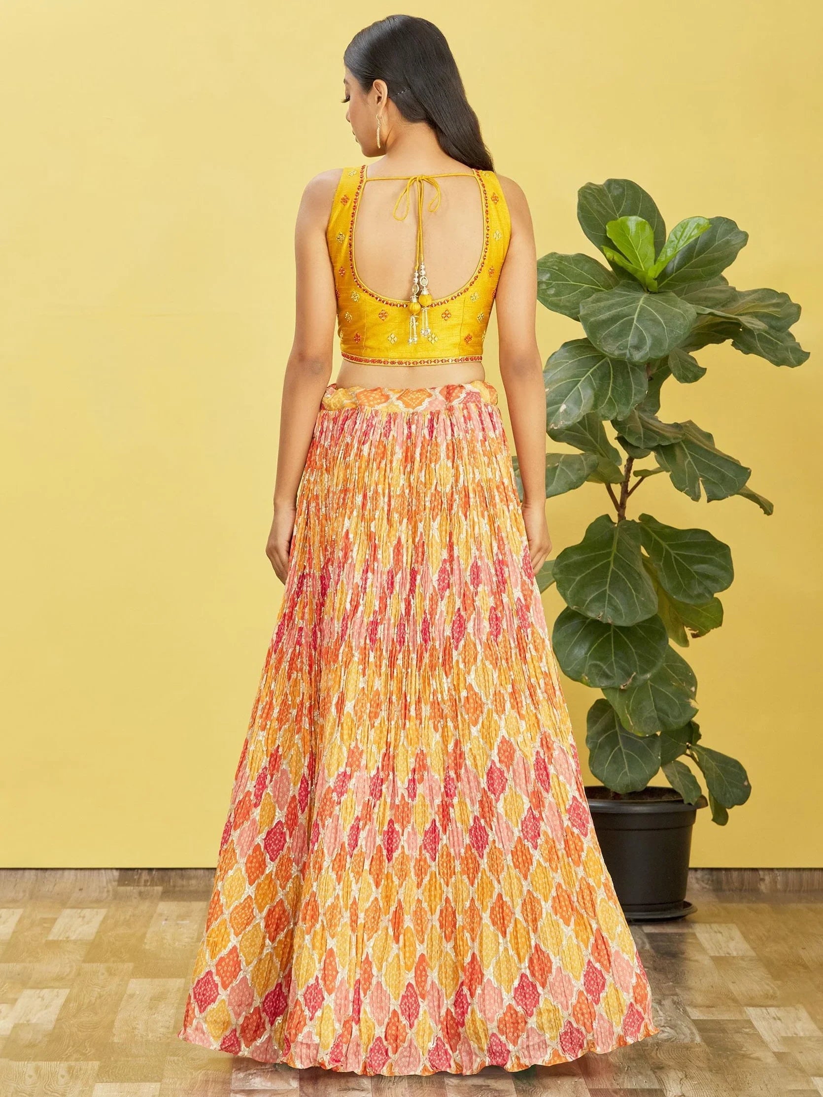 Chinon lehenga choli with mirror work and thread embroidery for haldi ceremony and festive wear