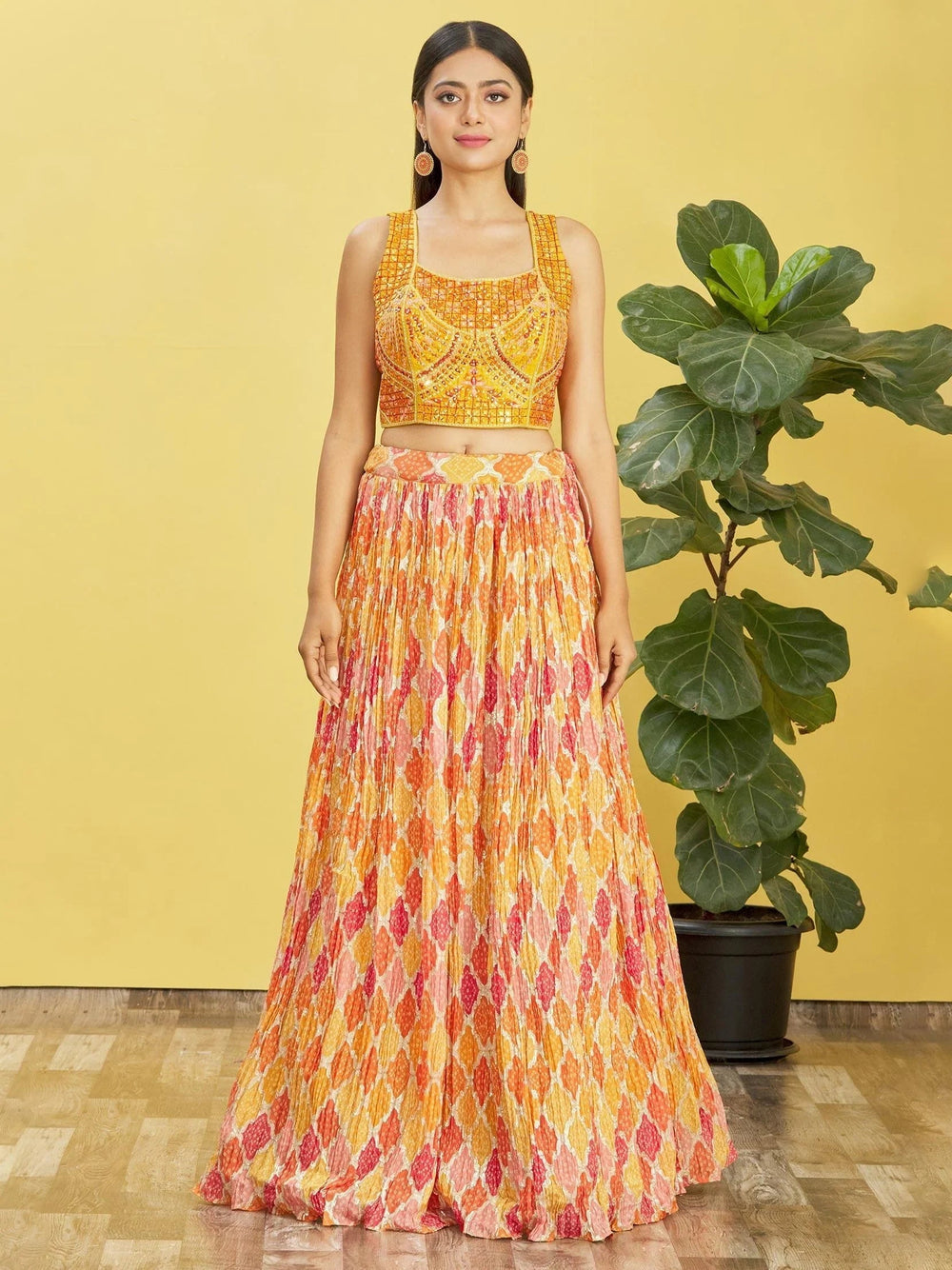 Chinon lehenga choli with mirror work and thread embroidery for haldi ceremony and festive wear