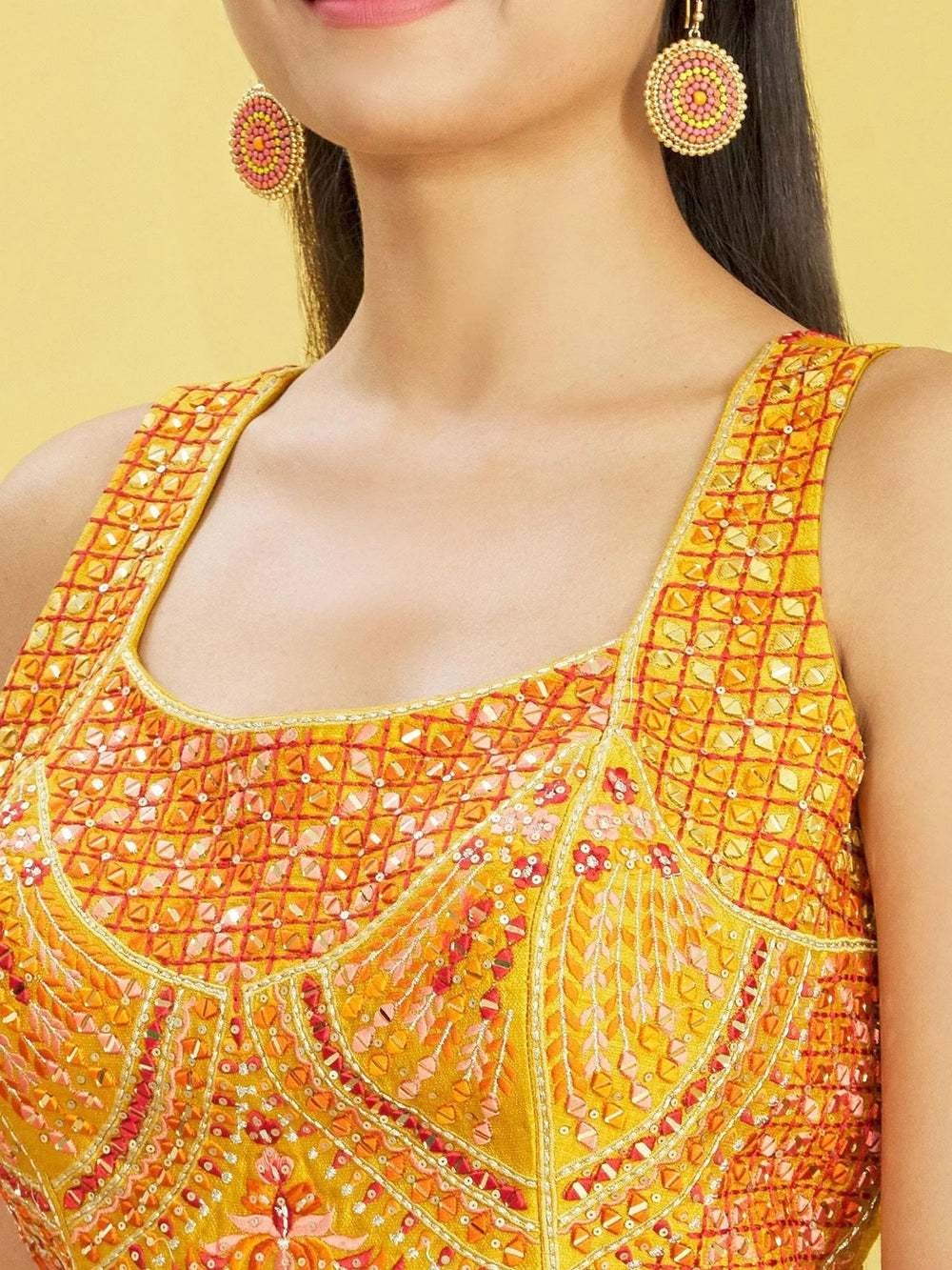 Chinon lehenga choli with mirror work and thread embroidery for haldi ceremony and festive wear