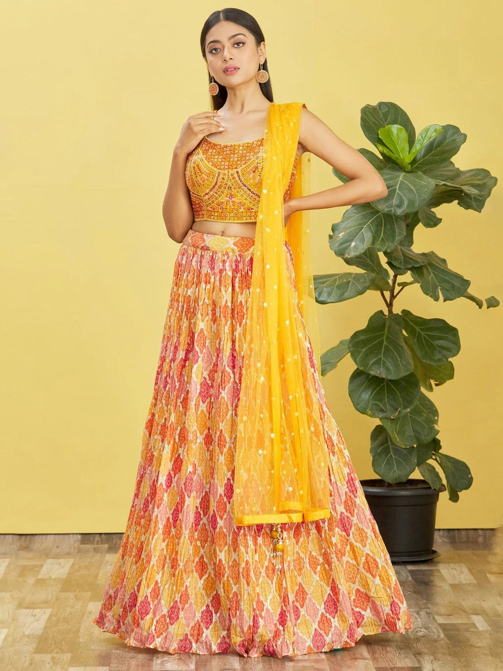 Chinon lehenga choli with mirror work and thread embroidery for haldi ceremony and festive wear