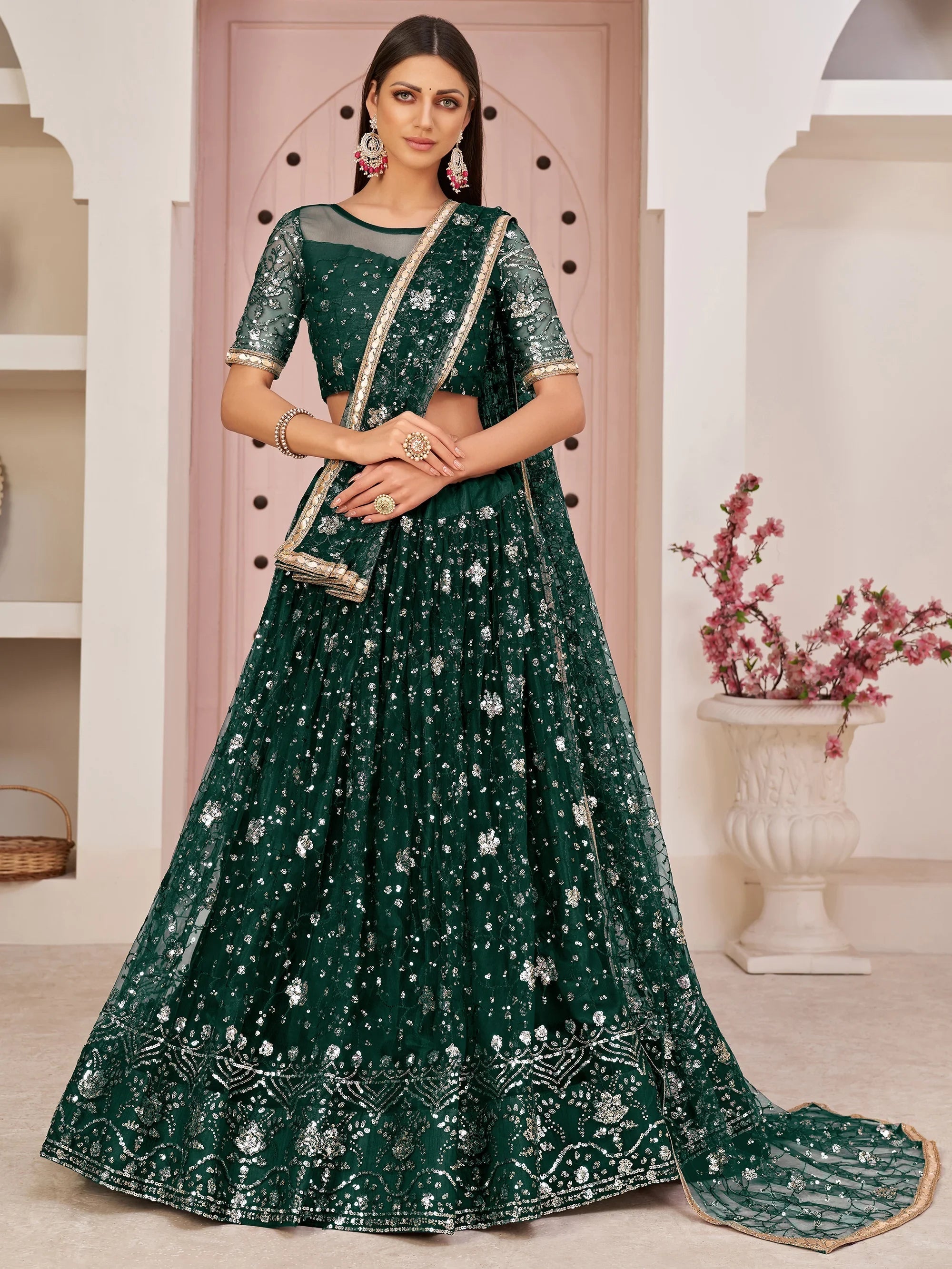 Bottle Green Magnicifent Sequins Embroidered Net Lehenga Choli for Women