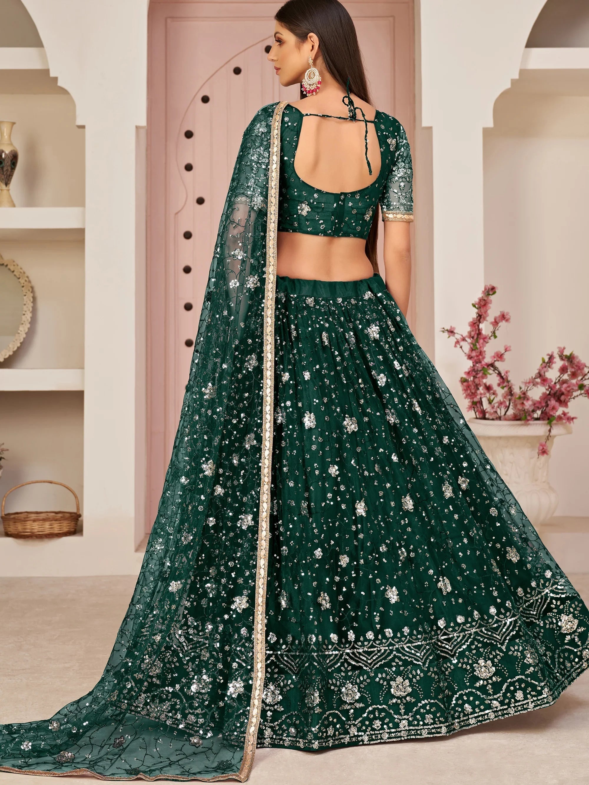 Bottle Green Magnicifent Sequins Embroidered Net Lehenga Choli for Women