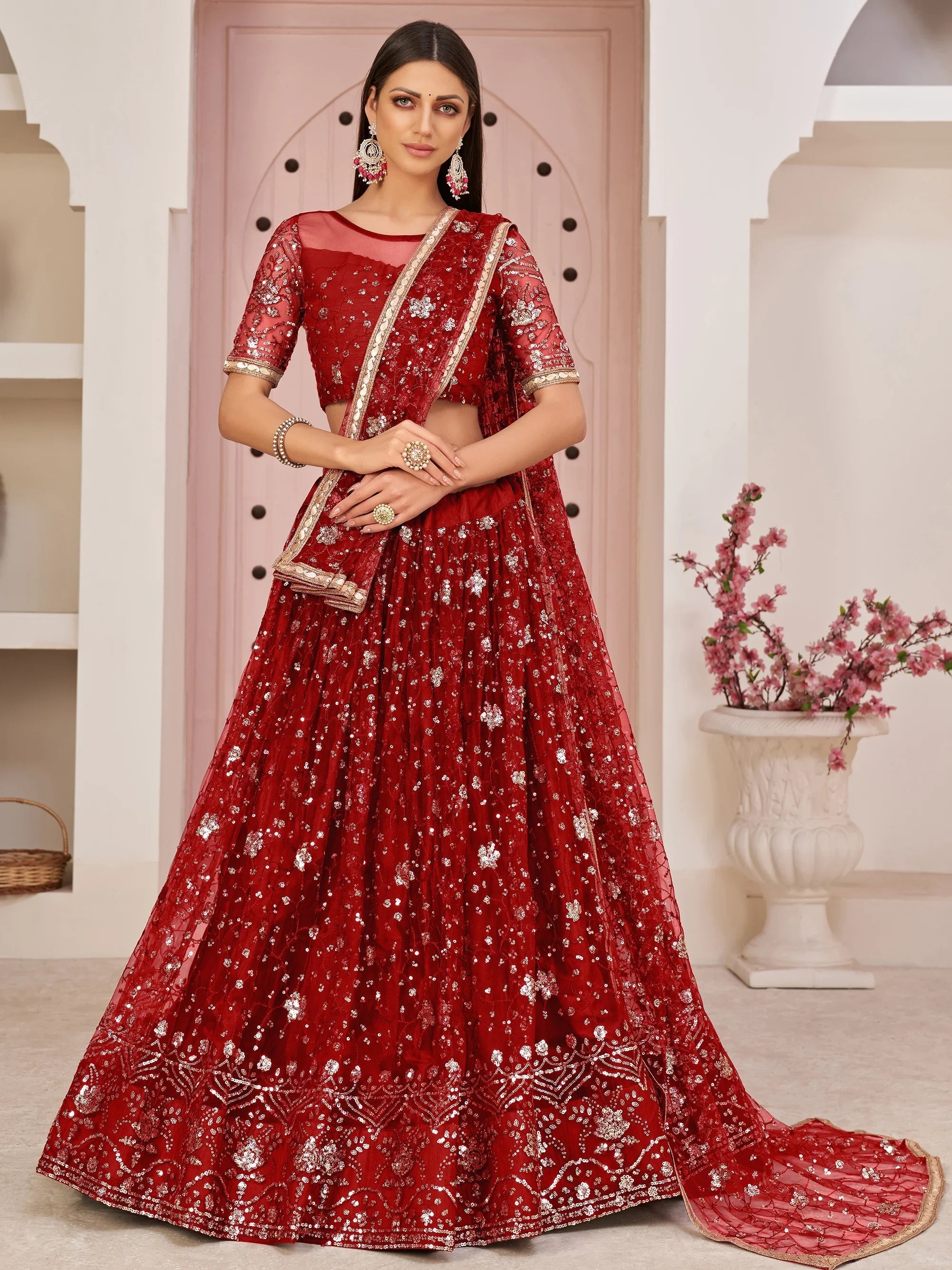 Red Magnicifent Sequins Embroidered Net Lehenga Choli for Women