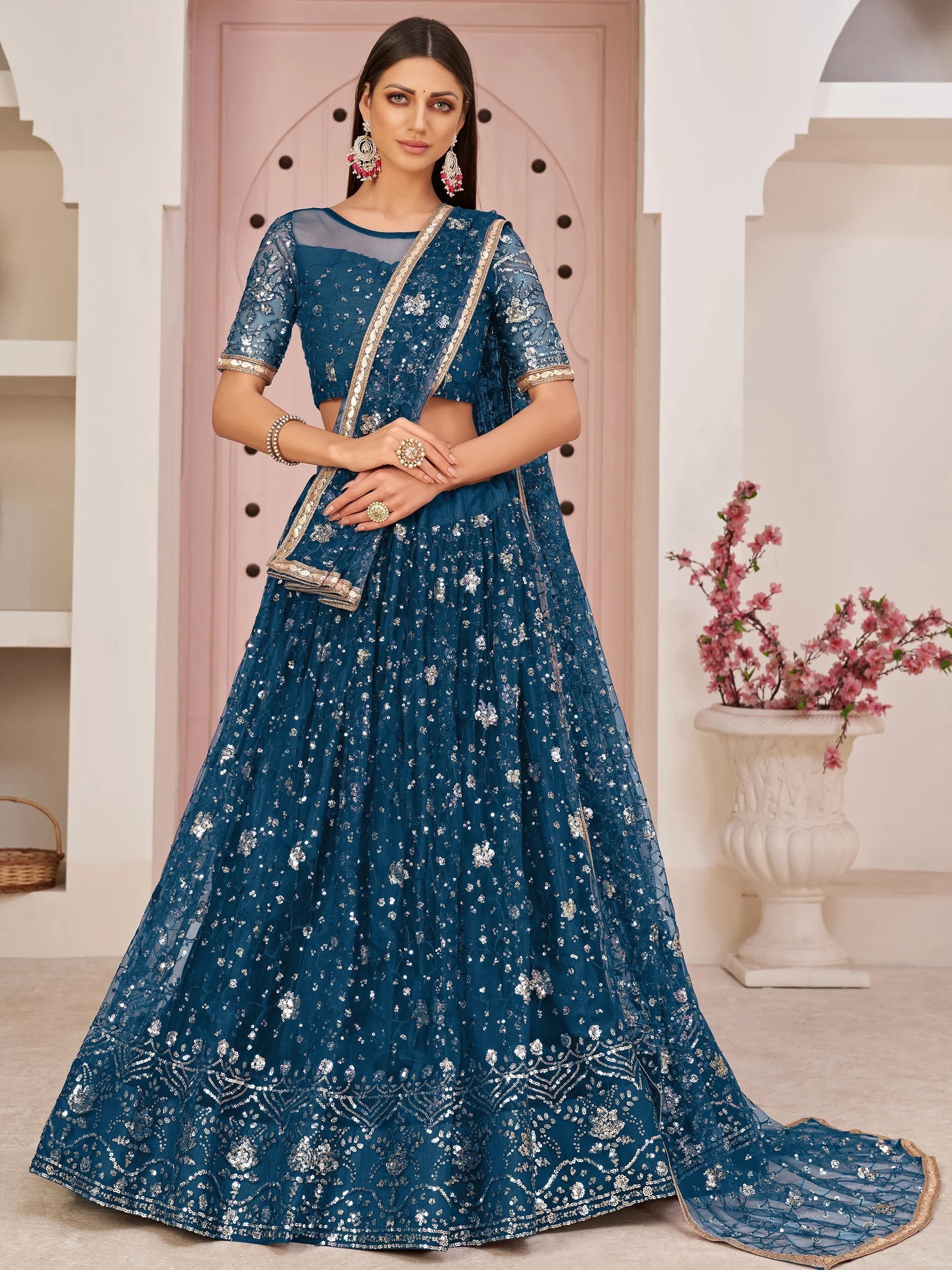 Blue Magnicifent Sequins Embroidered Net Lehenga Choli for Women