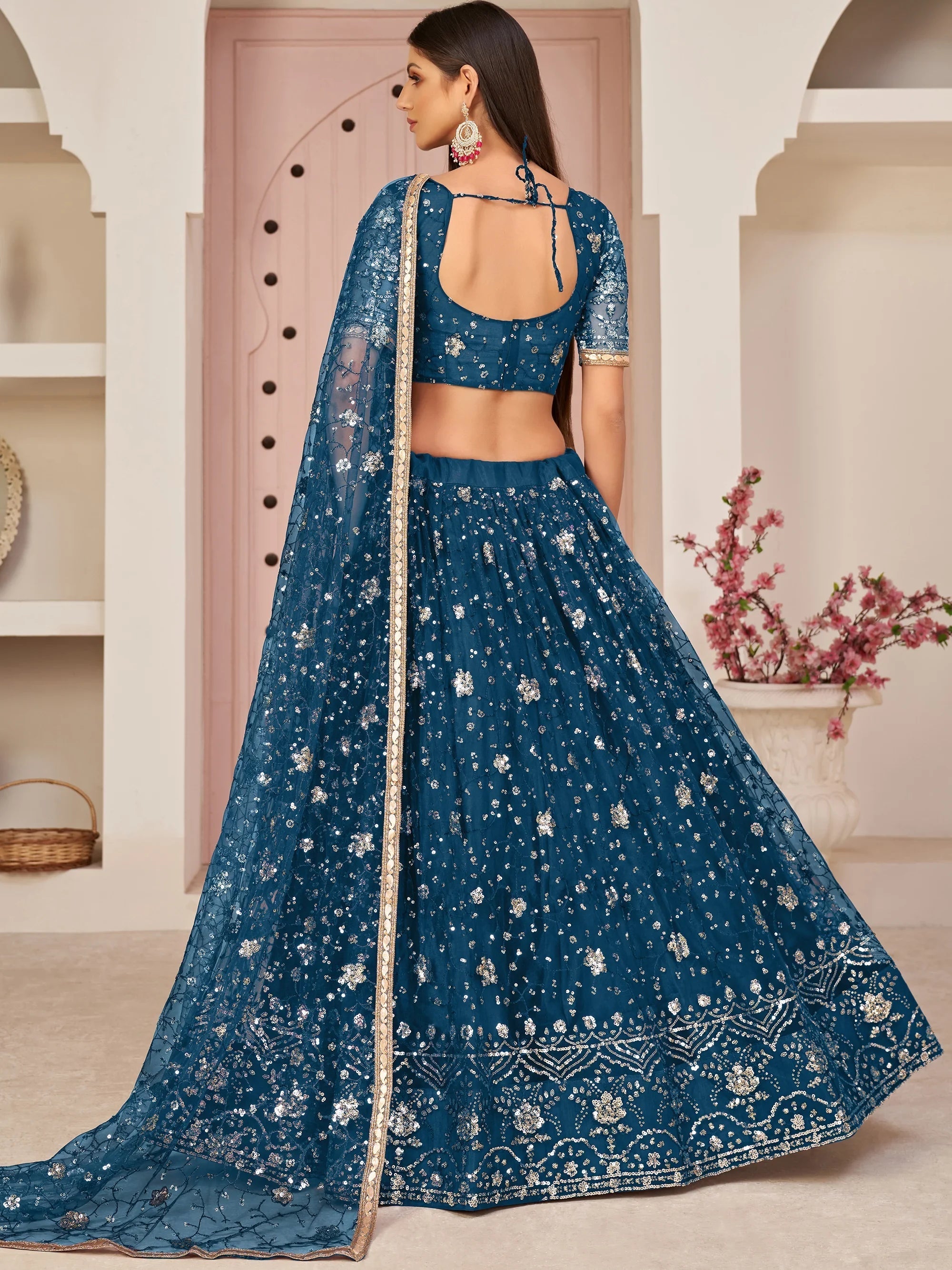 Blue Magnicifent Sequins Embroidered Net Lehenga Choli for Women
