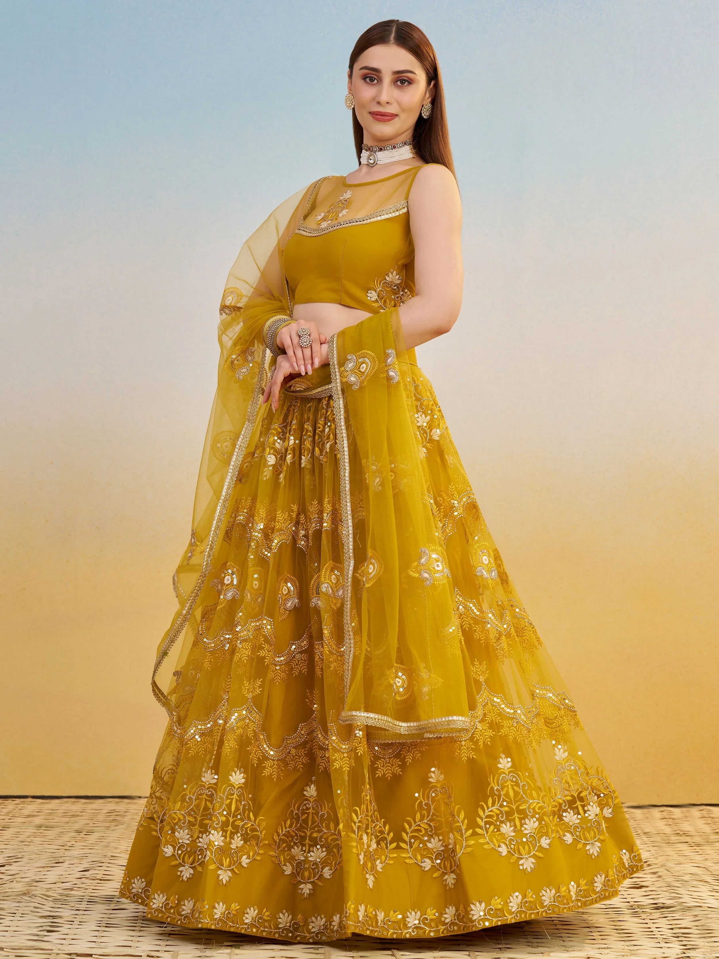 Mustard Yellow Thread Embroidered Net Haldi Wear Lehenga Choli for Women