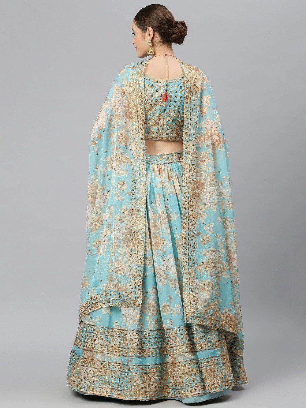 Organza lehenga choli with sequin embellishment and floral embroidery for wedding occasions