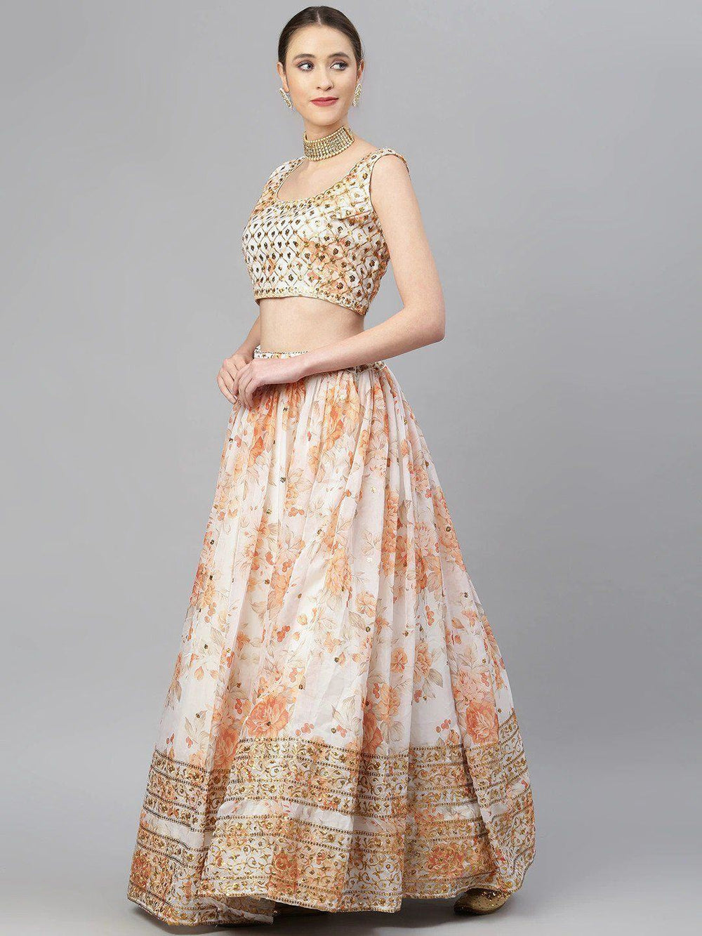 Organza lehenga choli with sequin embellishment and floral embroidery for wedding and festive wear