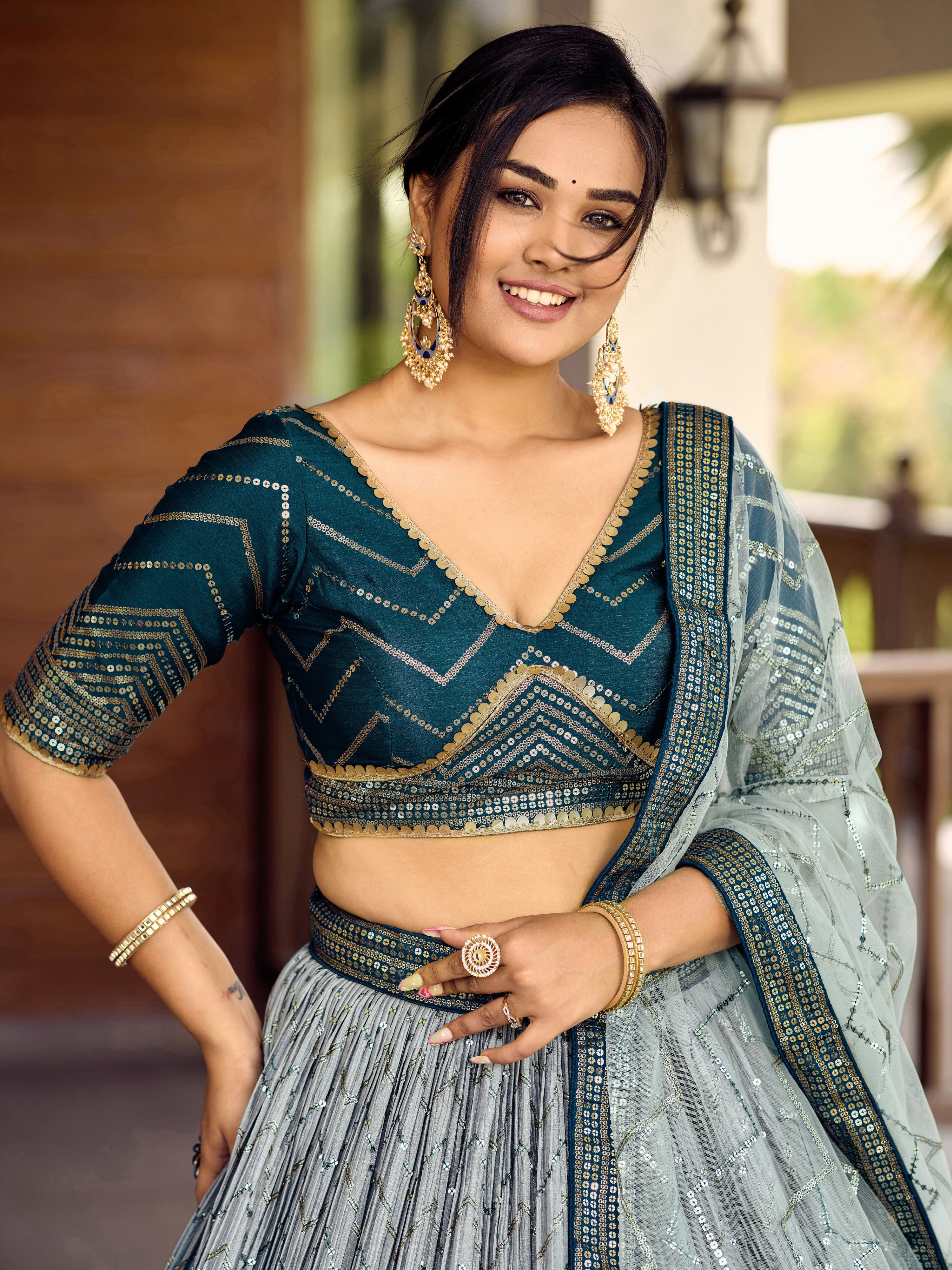 Blue Sensational Sequins Chinon Function Lehenga Choli for Ladies