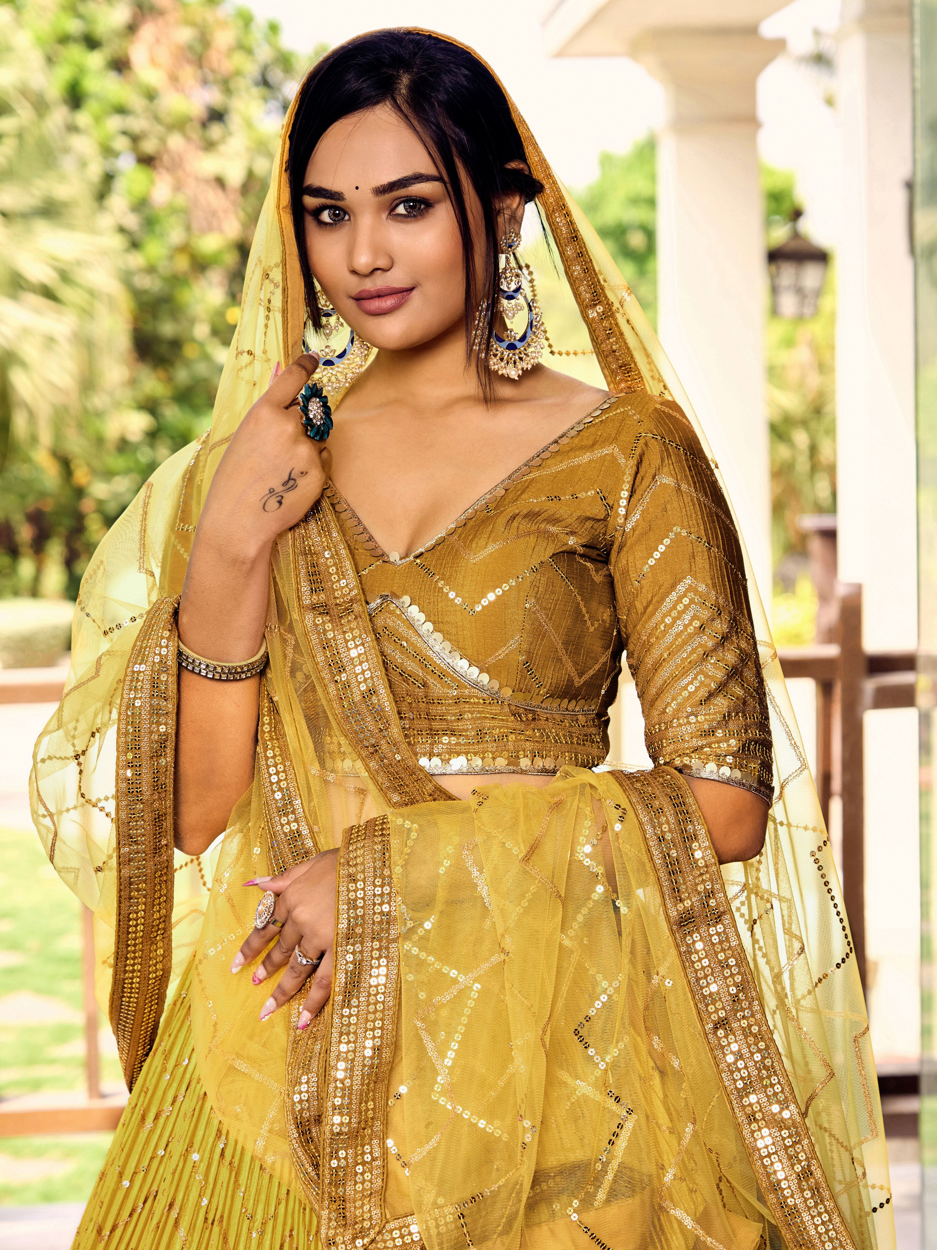 Yellow Sensational Sequins Chinon Function Lehenga Choli for Ladies