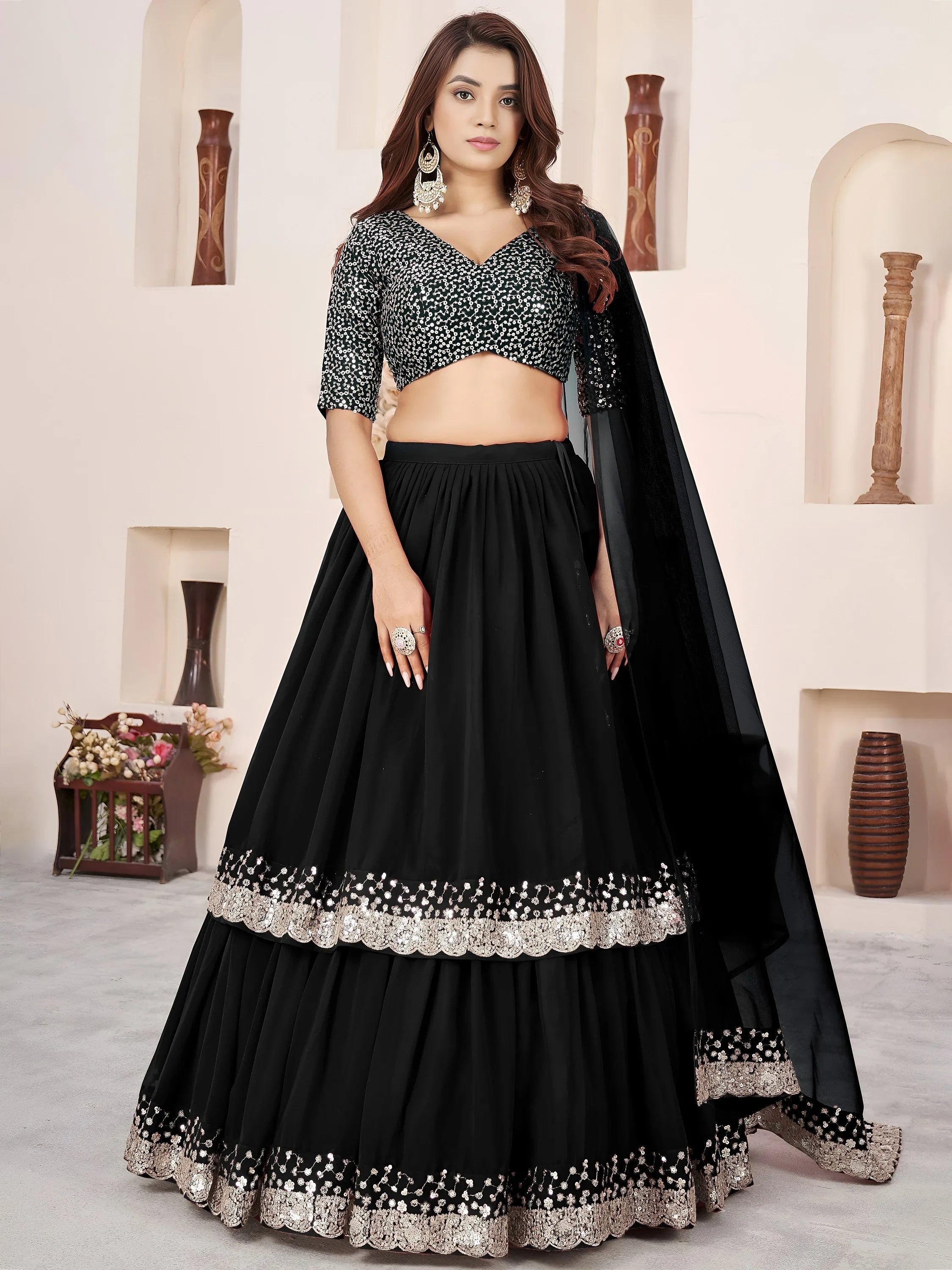 Sequins embroidered georgette lehenga choli for wedding reception and party wear
