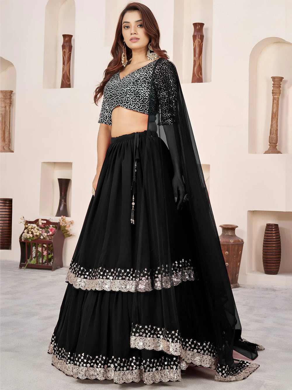 Sequins embroidered georgette lehenga choli for wedding reception and party wear