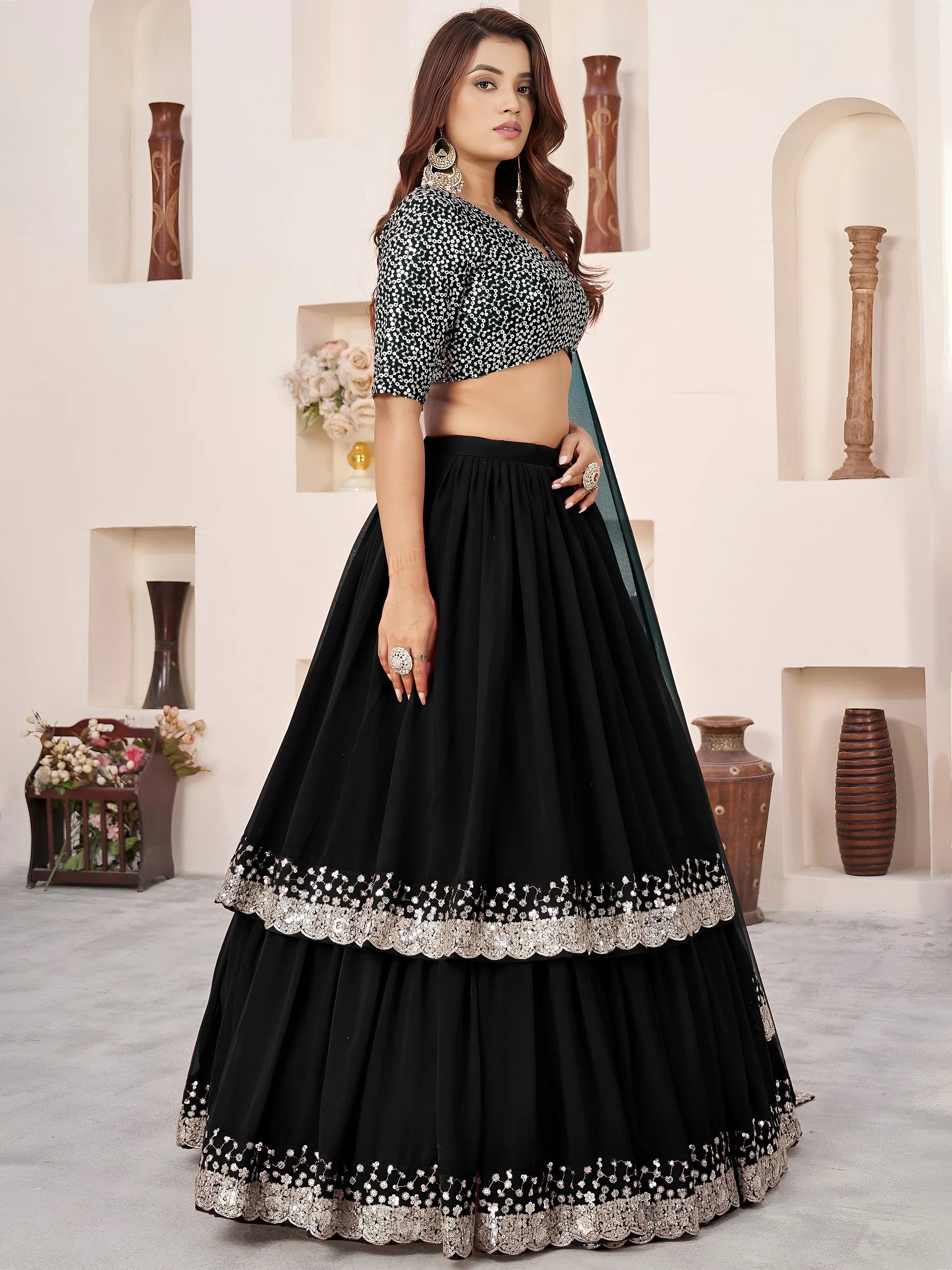 Sequins embroidered georgette lehenga choli for wedding reception and party wear