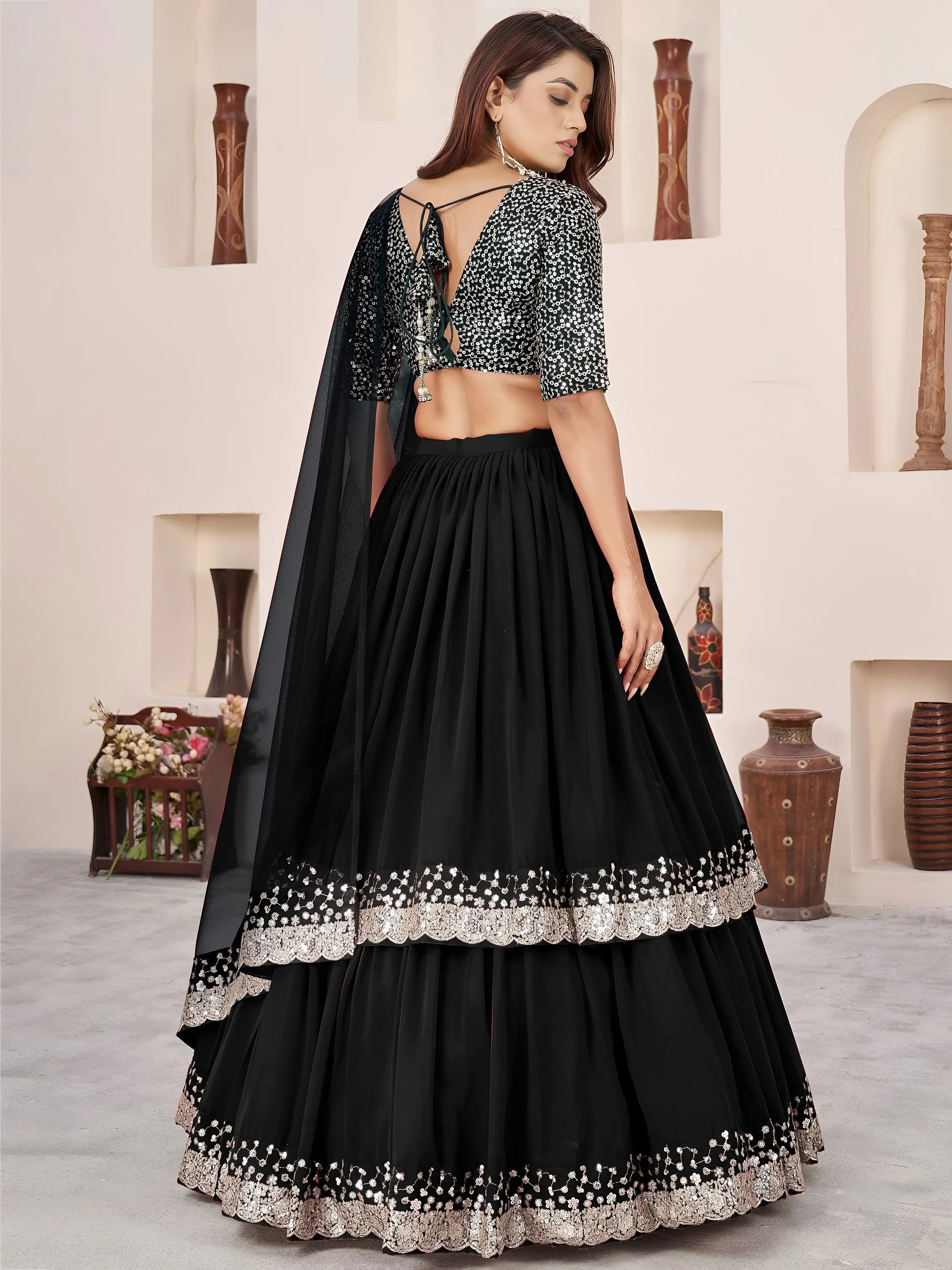 Sequins embroidered georgette lehenga choli for wedding reception and party wear