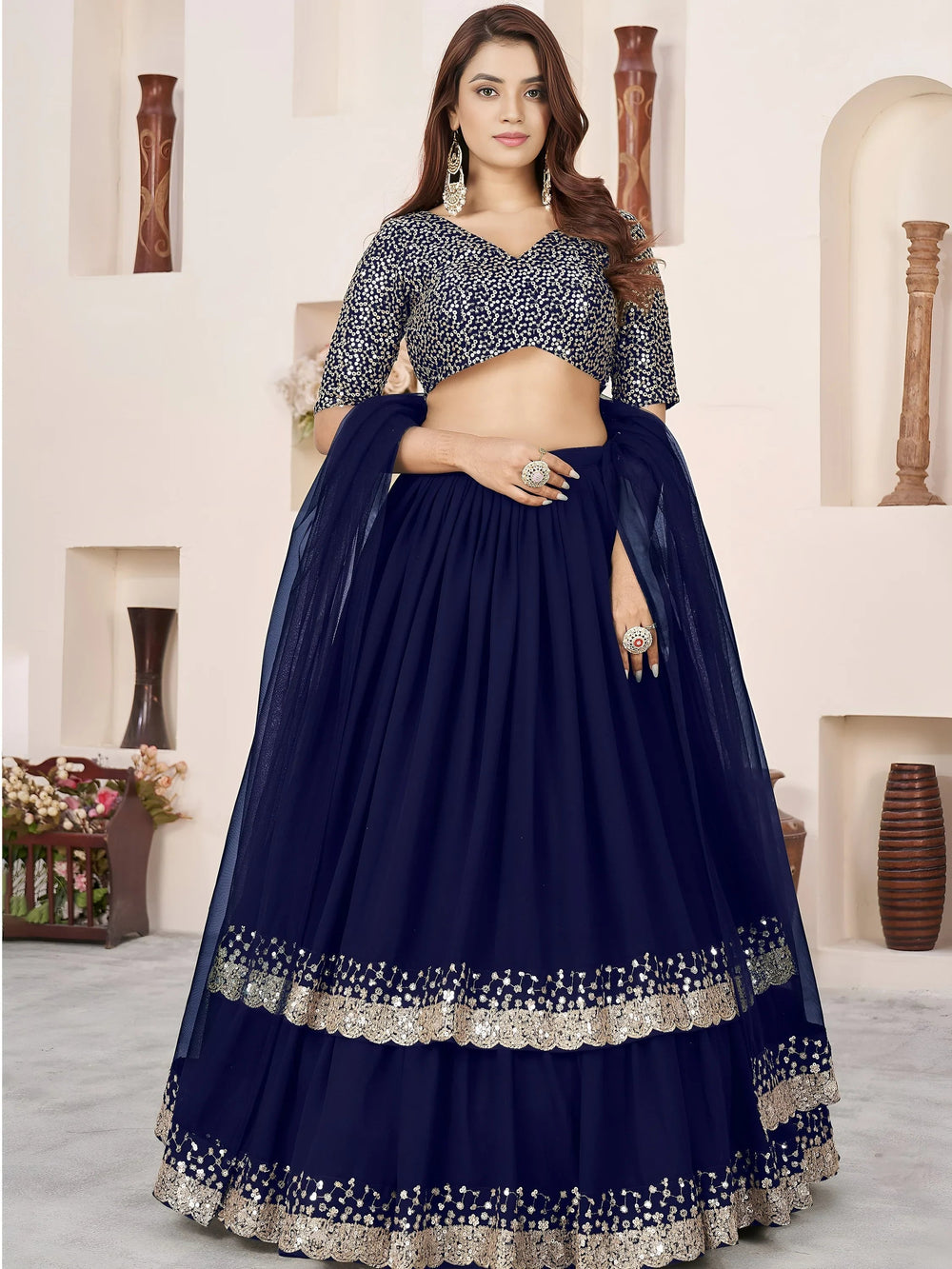 Sequins embroidered georgette lehenga choli for wedding reception and party wear