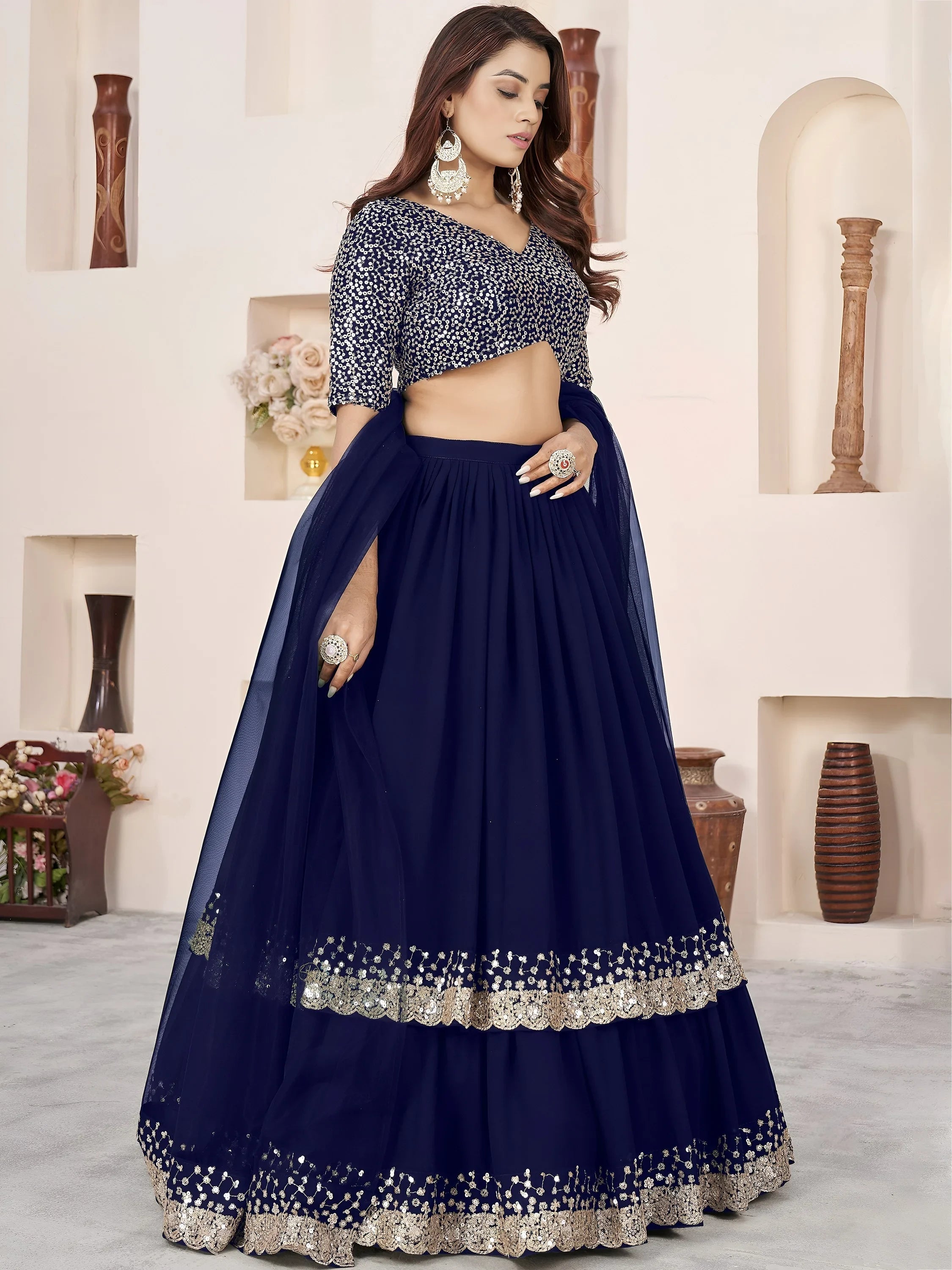 Sequins embroidered georgette lehenga choli for wedding reception and party wear