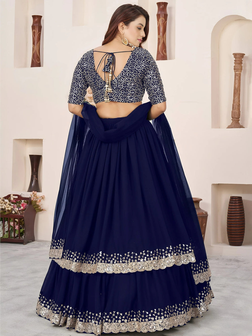 Sequins embroidered georgette lehenga choli for wedding reception and party wear
