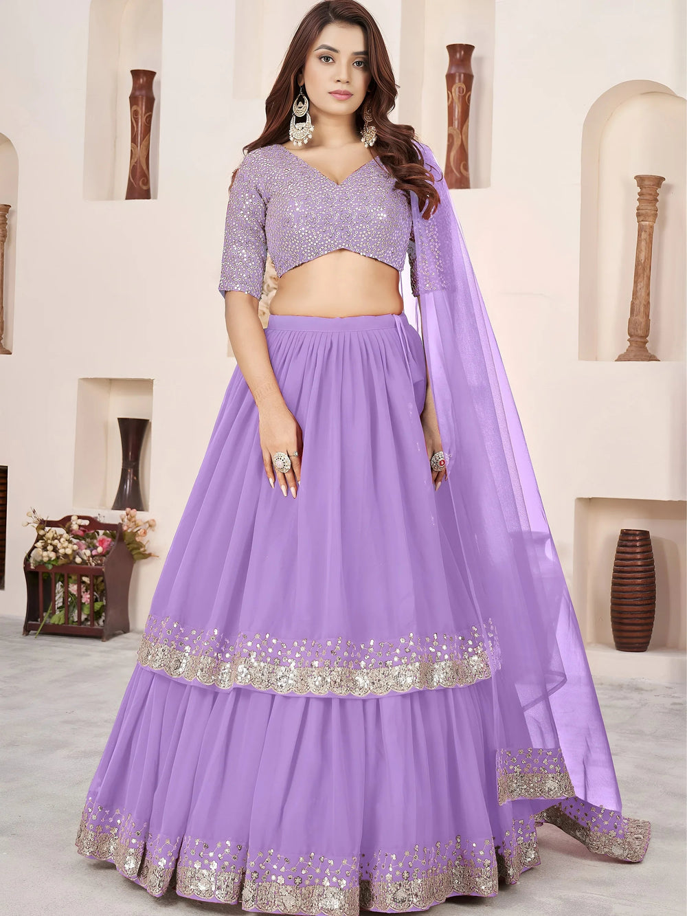 Sequins embroidered georgette lehenga choli for wedding reception and party wear