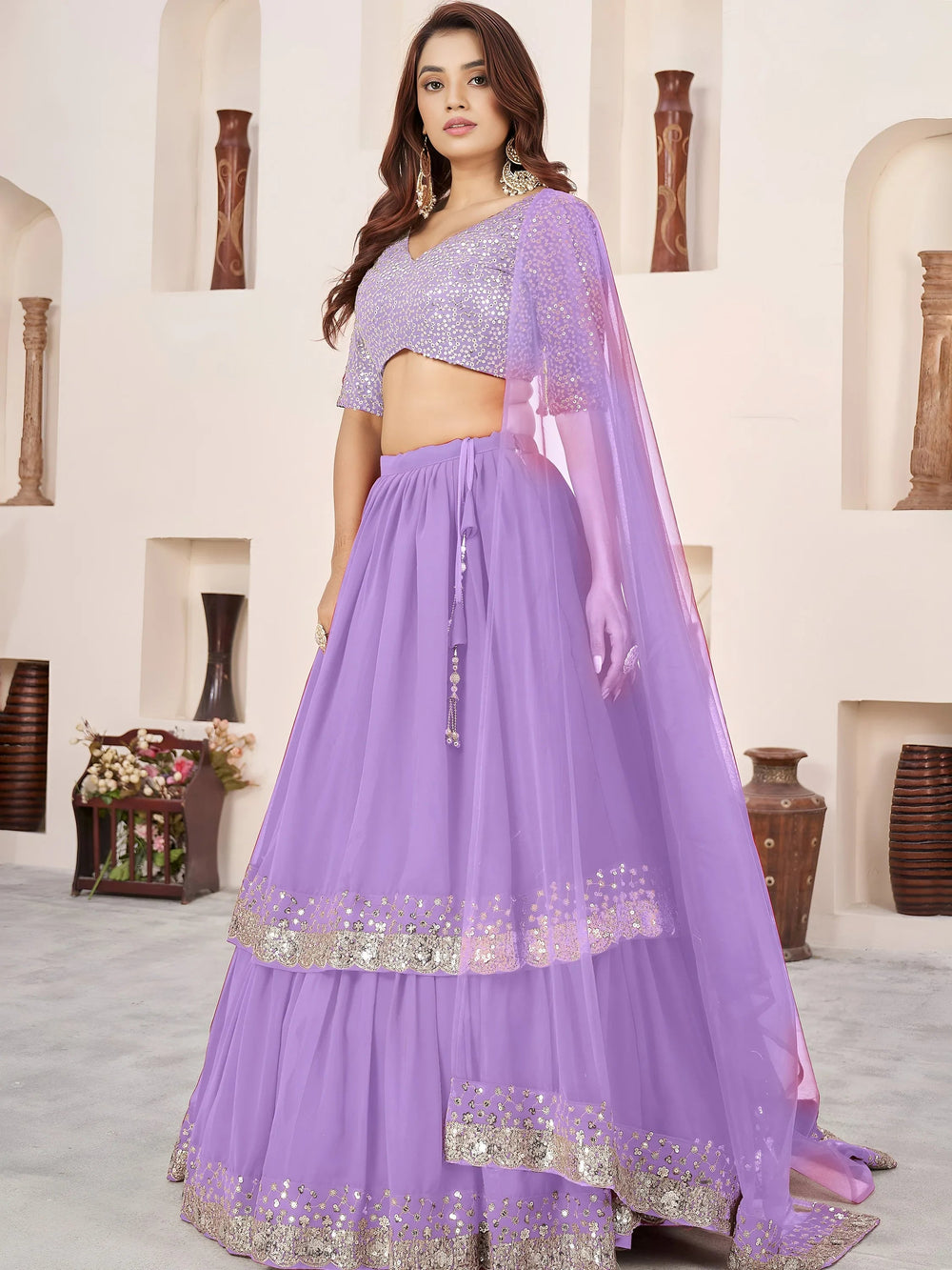 Sequins embroidered georgette lehenga choli for wedding reception and party wear