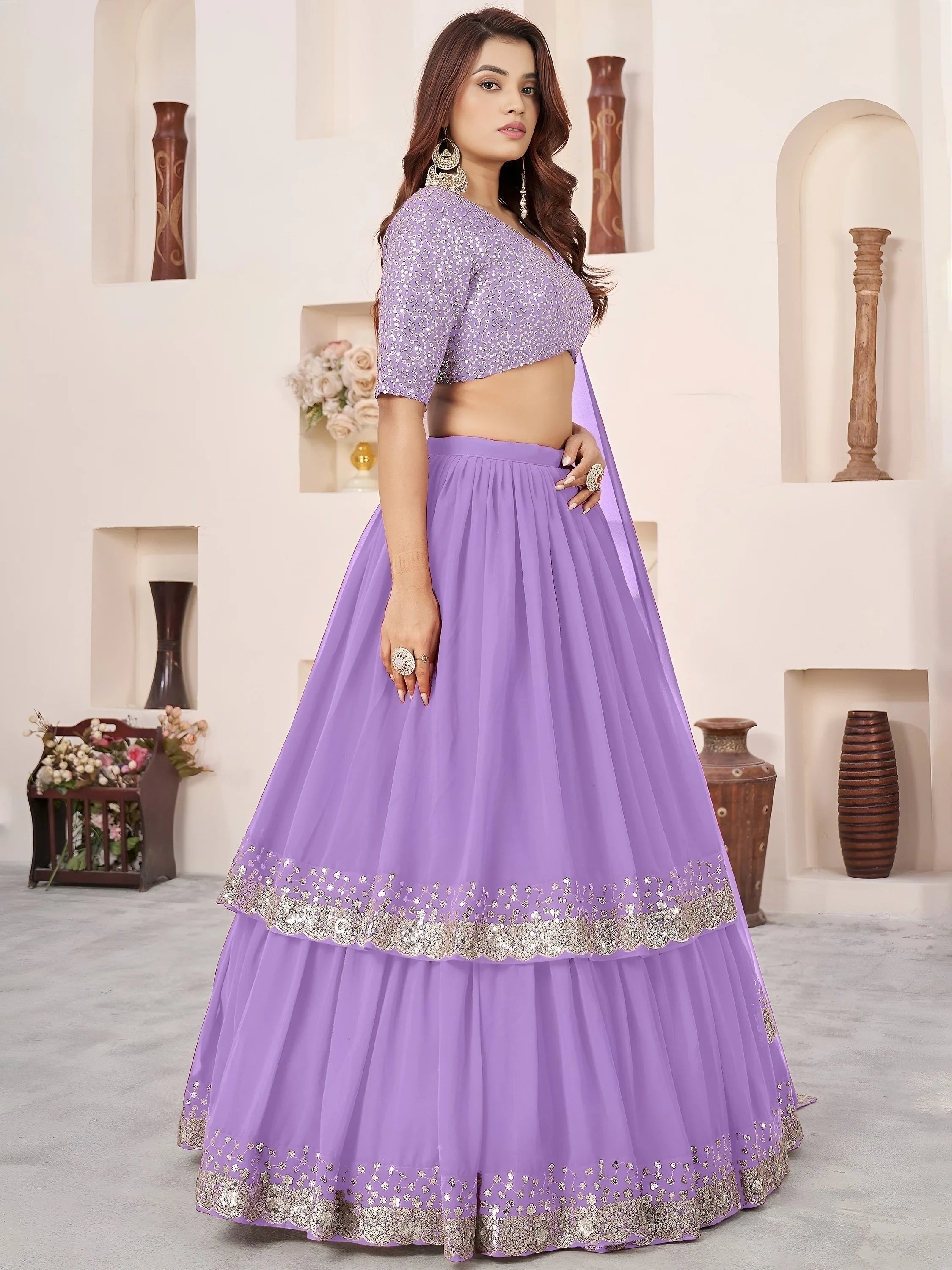 Sequins embroidered georgette lehenga choli for wedding reception and party wear