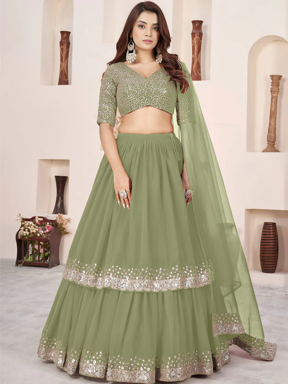 Sequins embroidered georgette lehenga choli for wedding reception and party wear