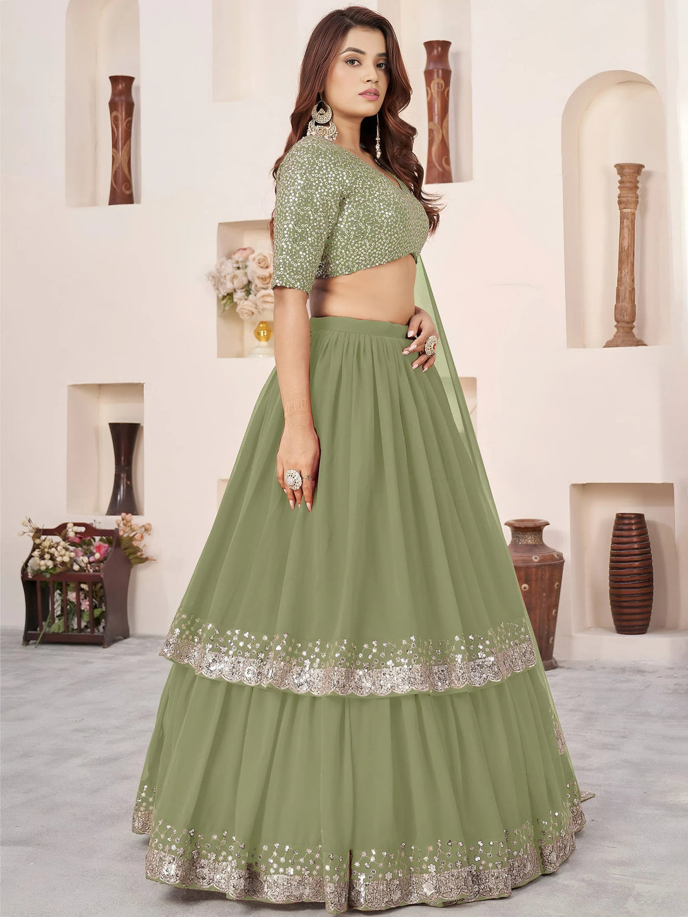 Sequins embroidered georgette lehenga choli for wedding reception and party wear