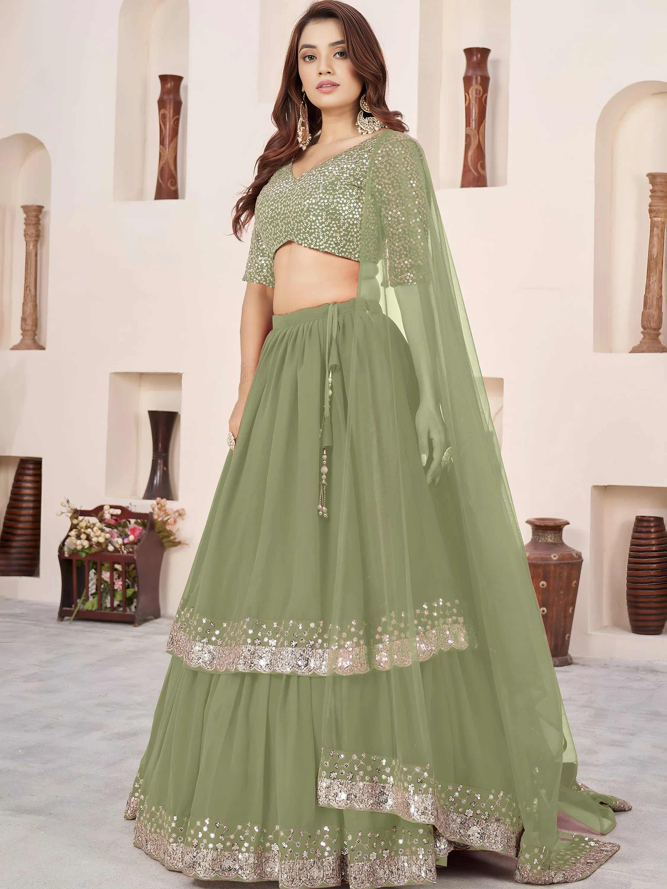 Sequins embroidered georgette lehenga choli for wedding reception and party wear
