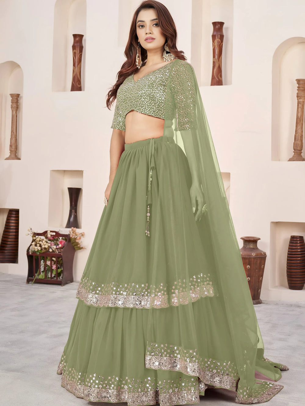 Sequins embroidered georgette lehenga choli for wedding reception and party wear