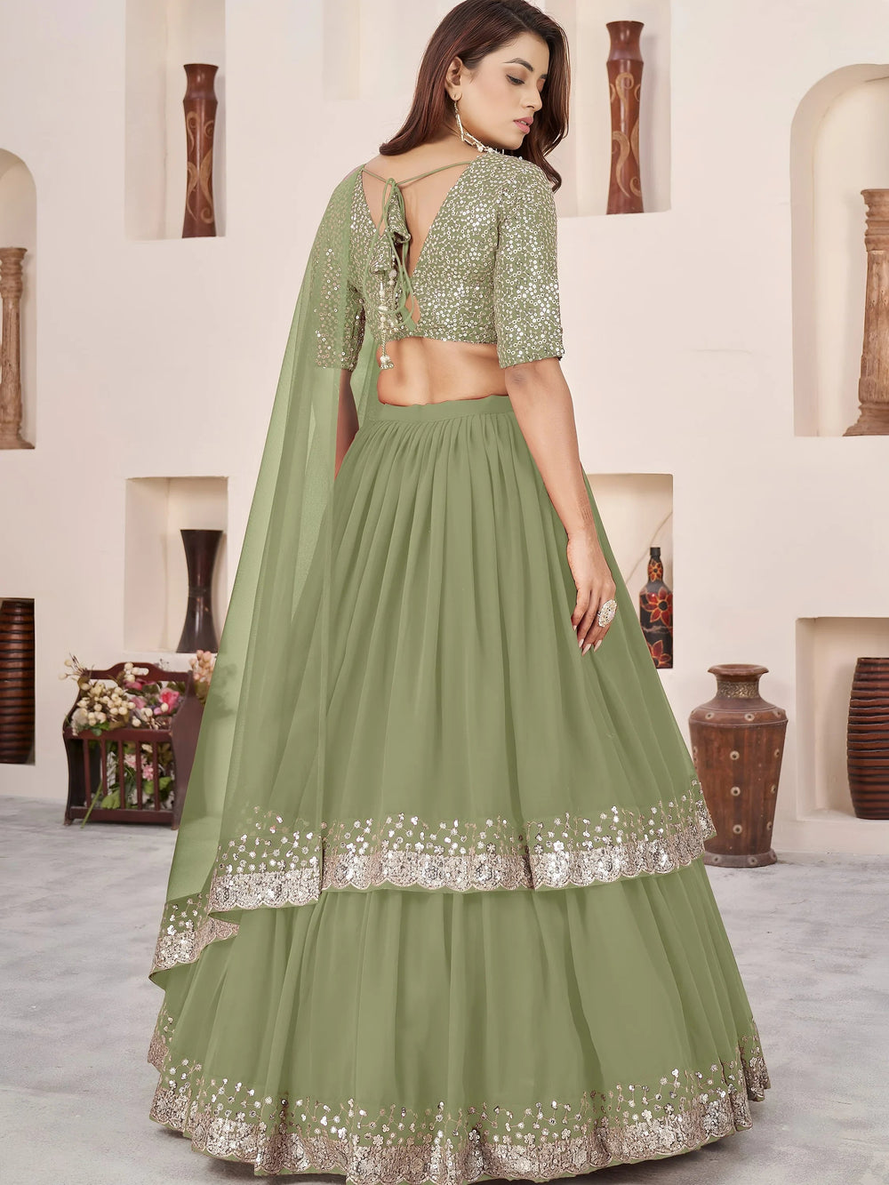 Sequins embroidered georgette lehenga choli for wedding reception and party wear