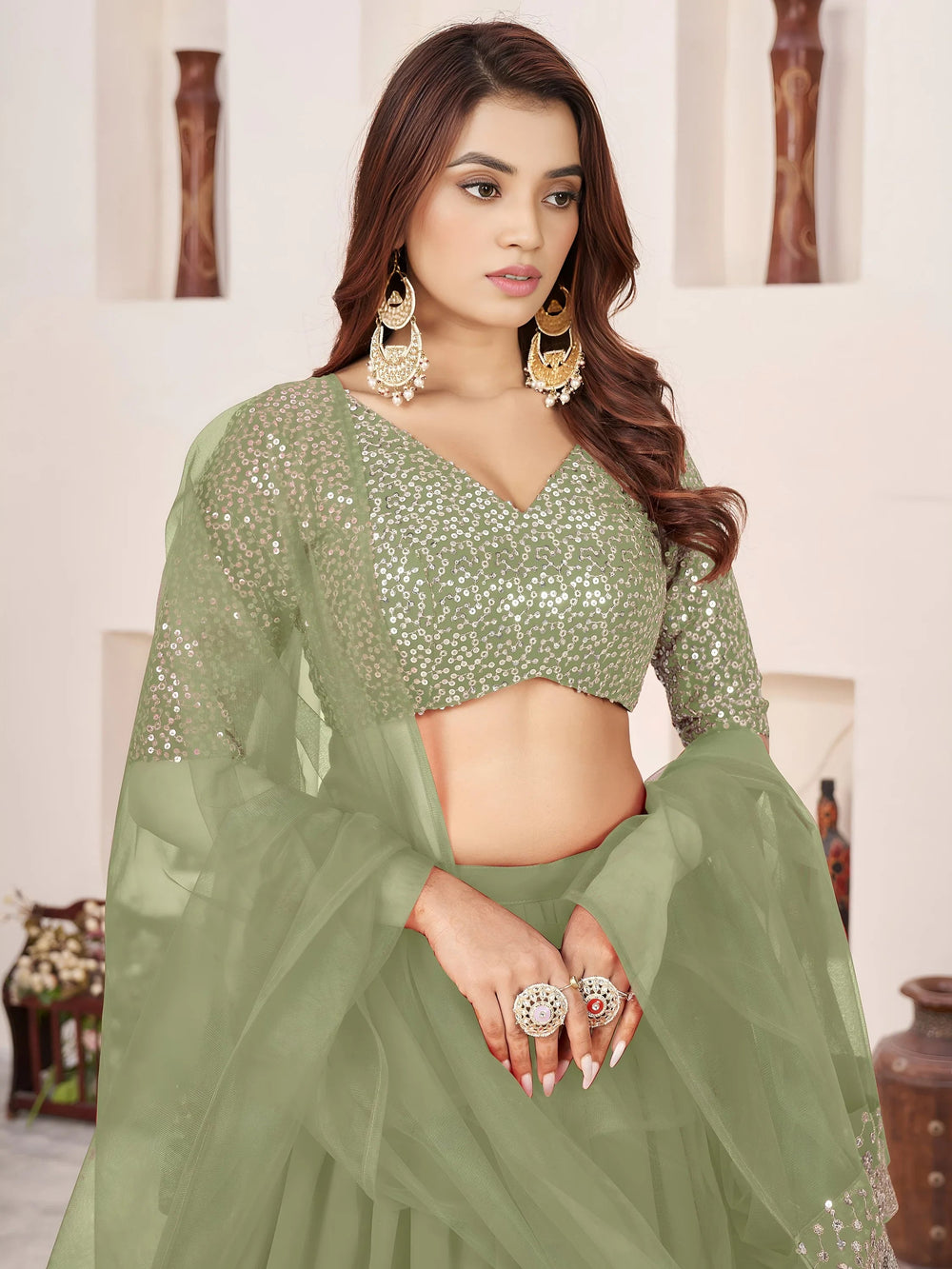Sequins embroidered georgette lehenga choli for wedding reception and party wear