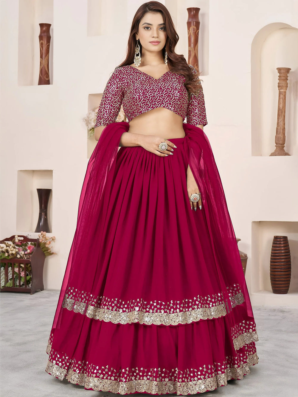 Sequins embroidered georgette lehenga choli for wedding reception and party wear