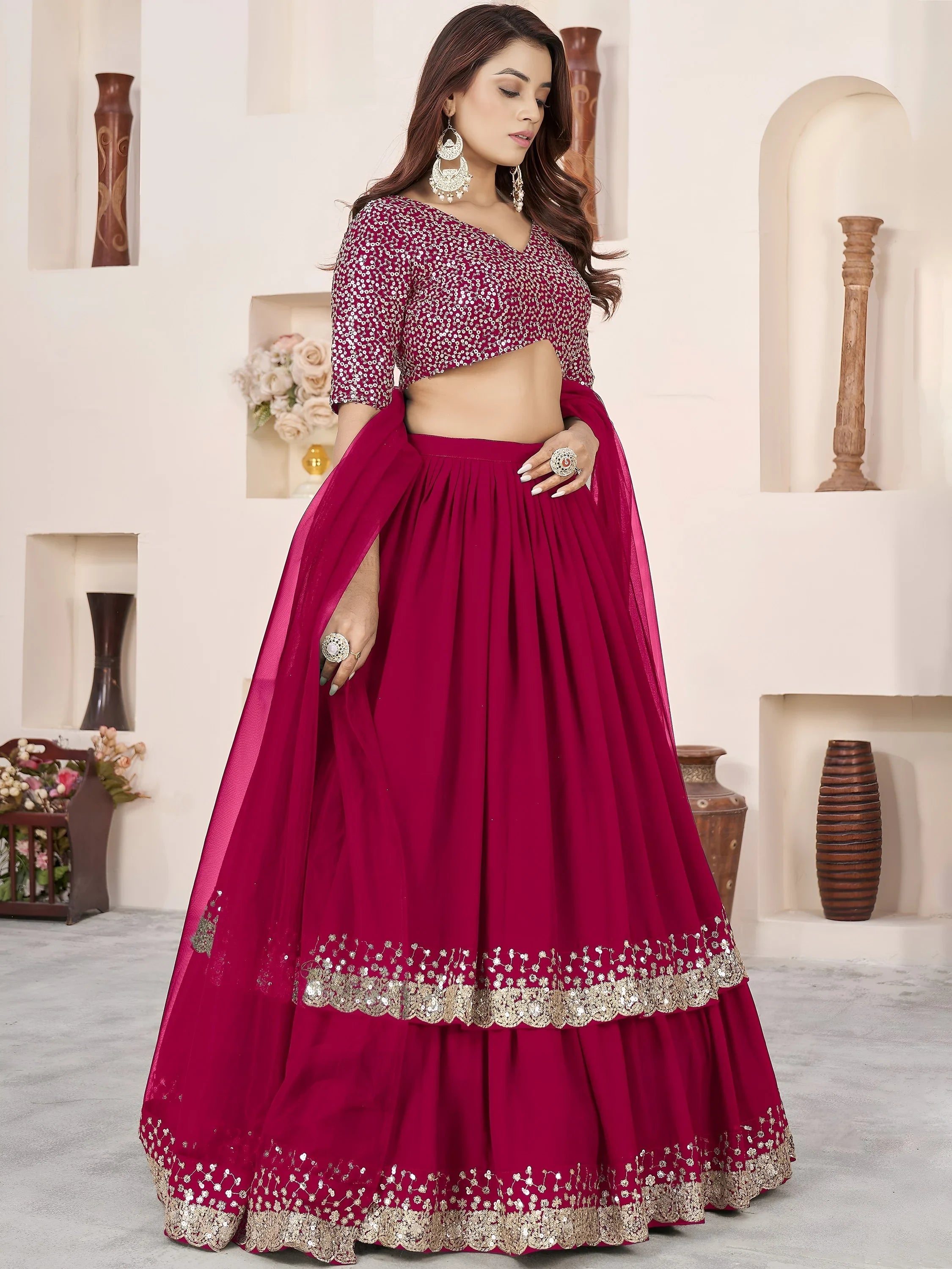Sequins embroidered georgette lehenga choli for wedding reception and party wear