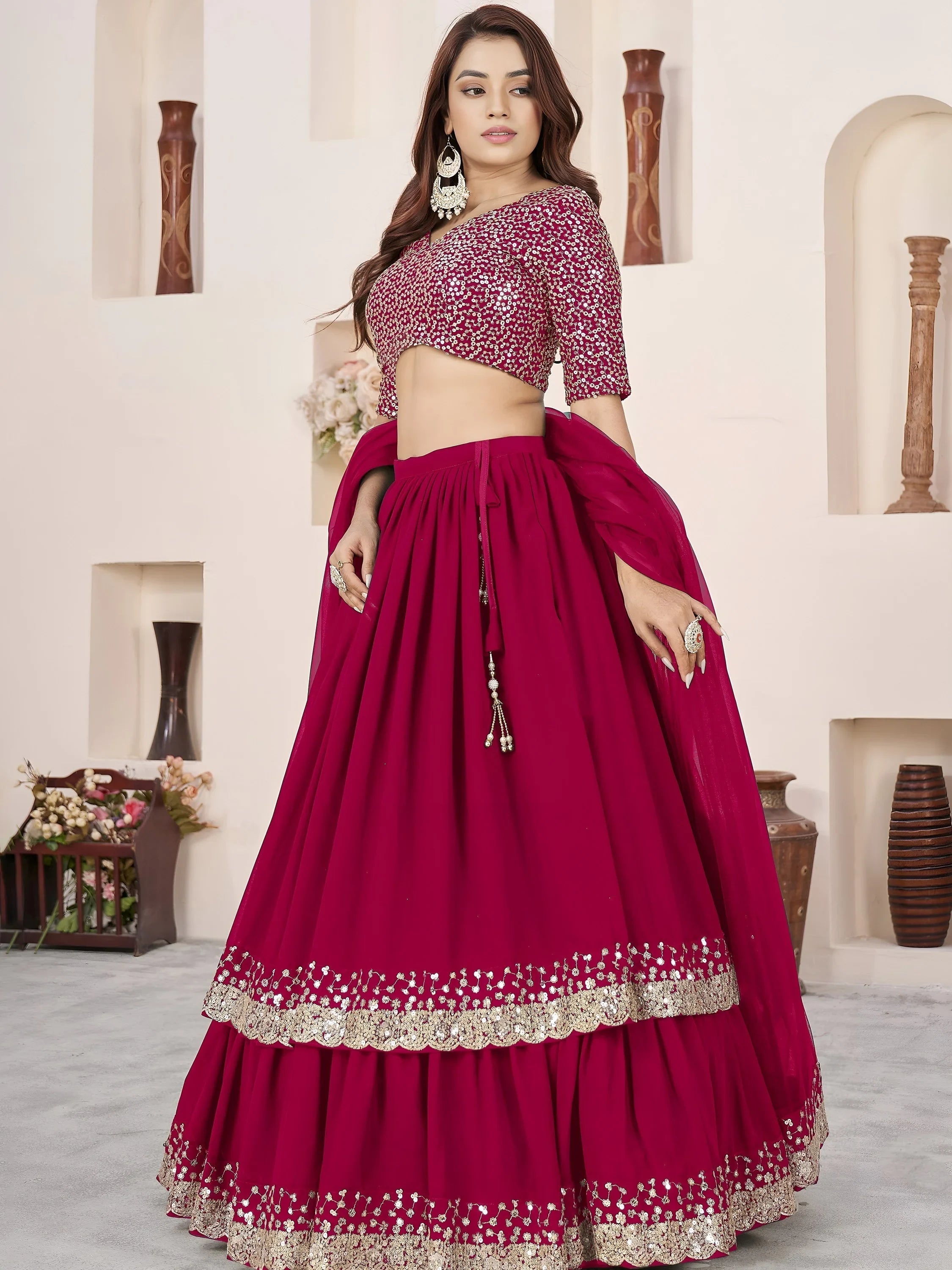 Sequins embroidered georgette lehenga choli for wedding reception and party wear