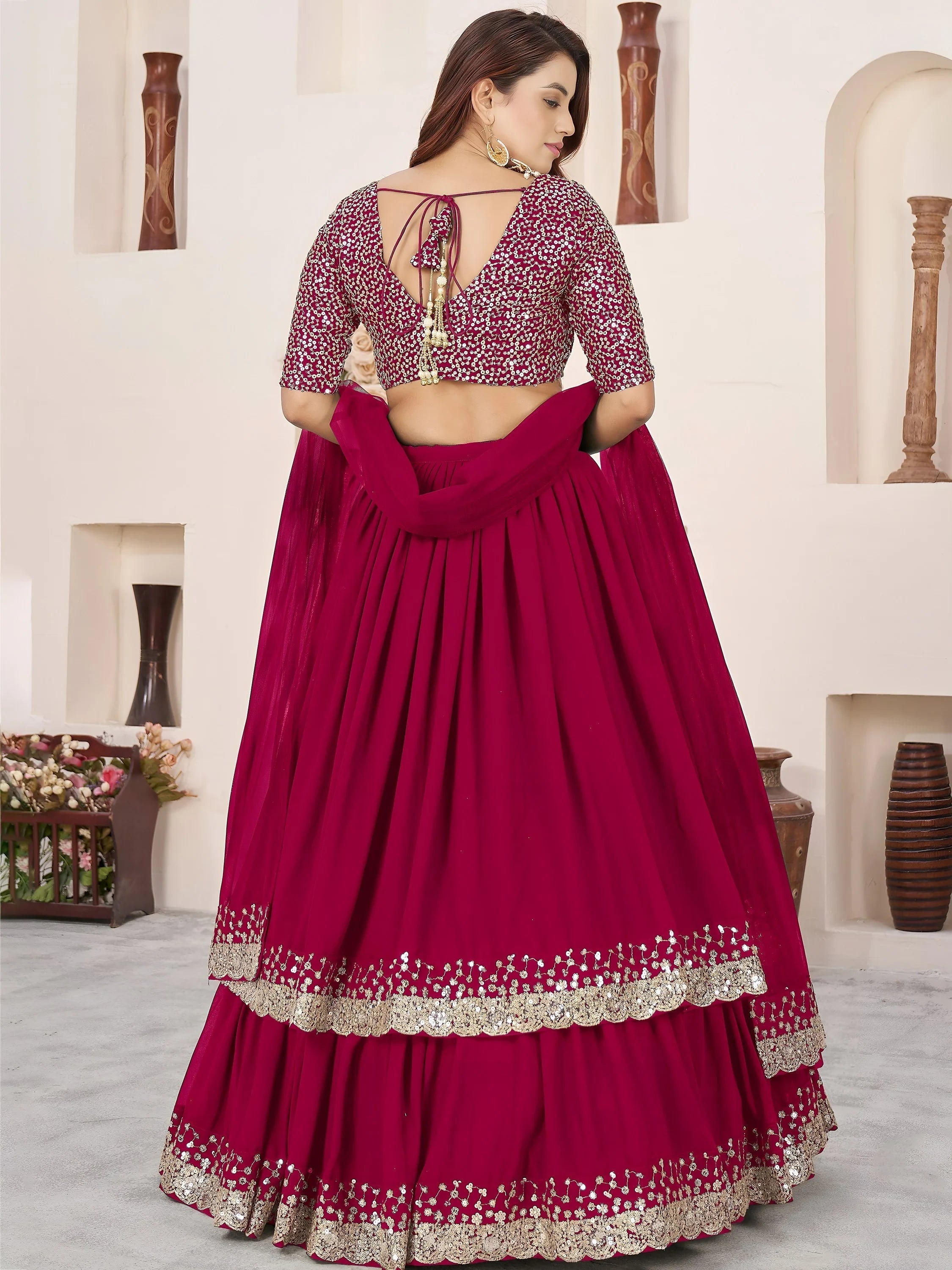 Sequins embroidered georgette lehenga choli for wedding reception and party wear