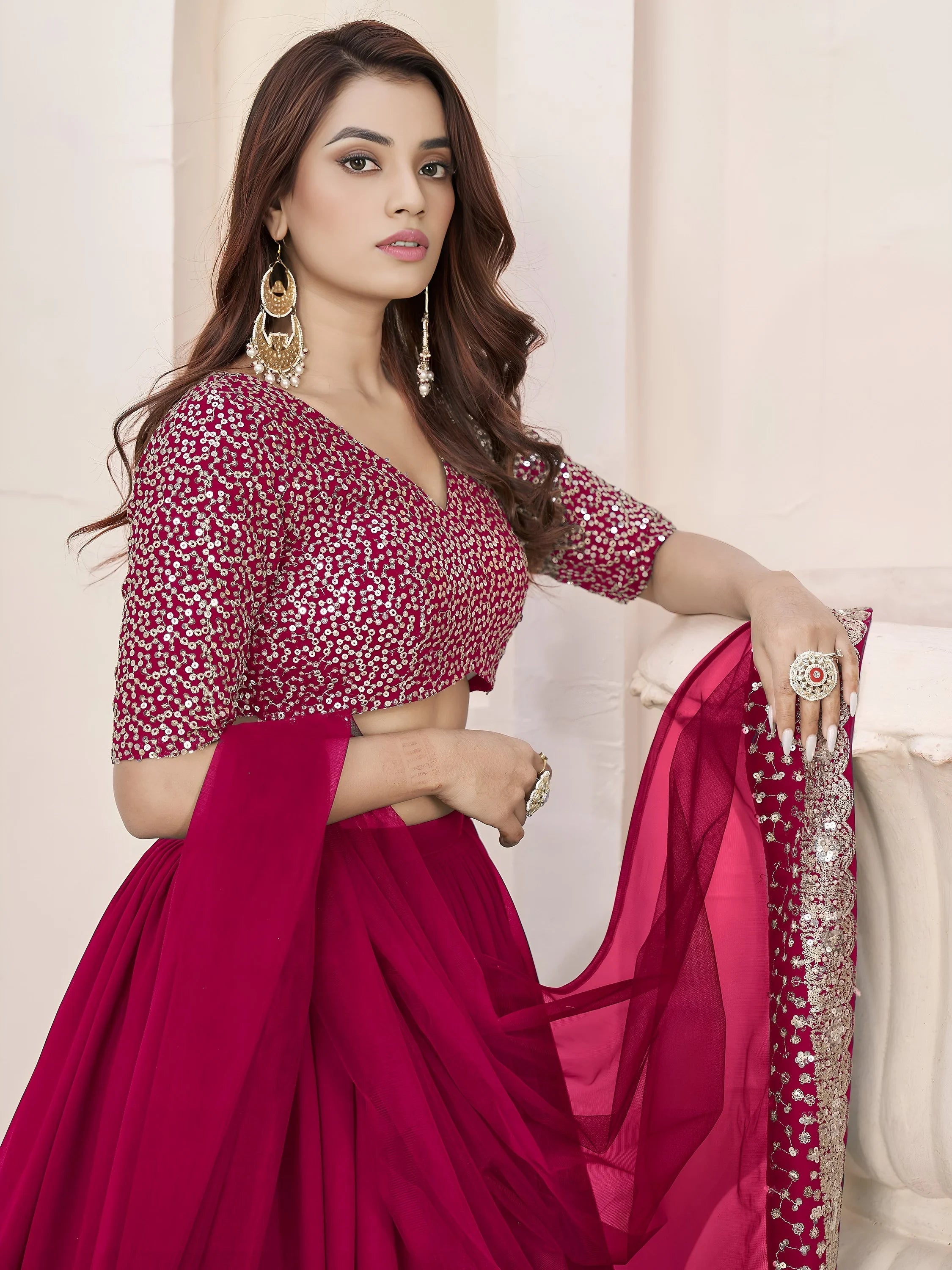 Sequins embroidered georgette lehenga choli for wedding reception and party wear