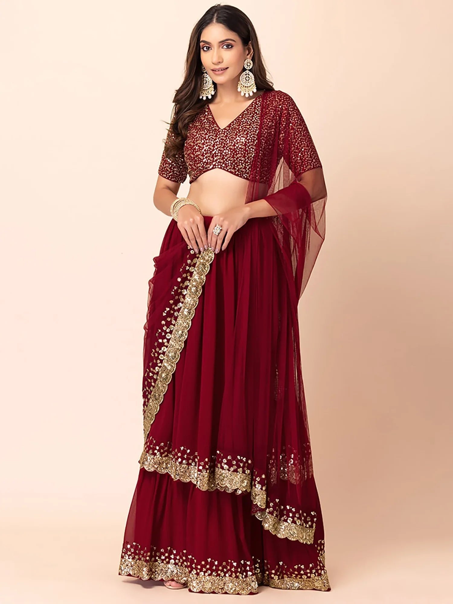 Sequins embroidered georgette lehenga choli for wedding reception and party wear