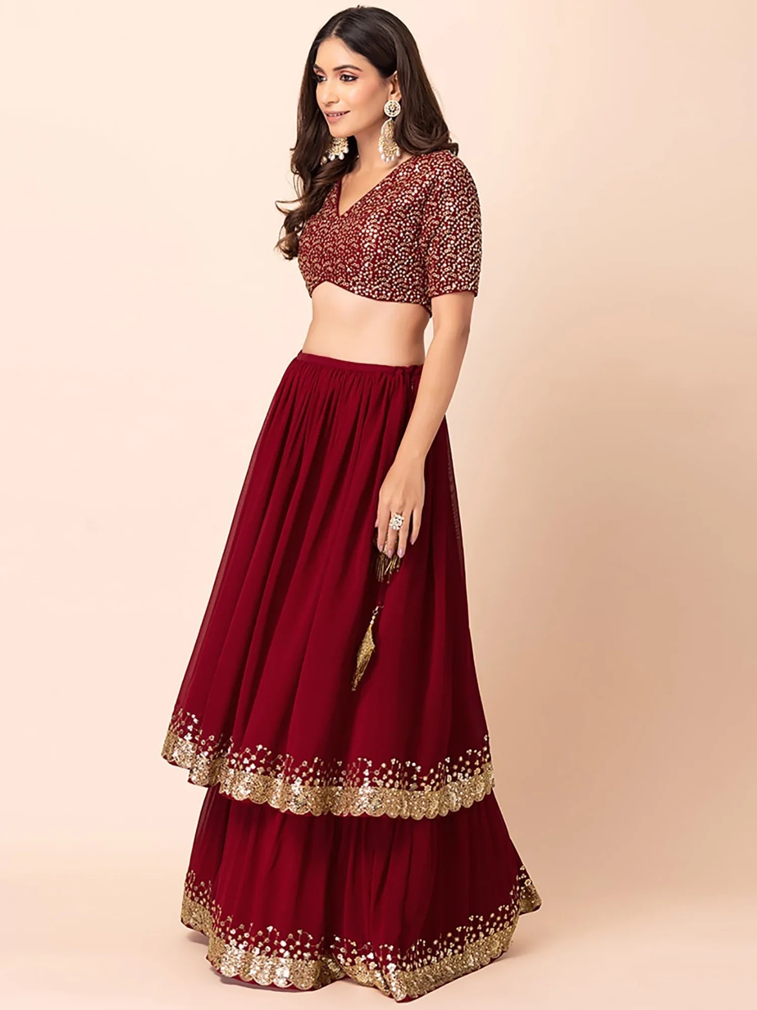 Sequins embroidered georgette lehenga choli for wedding reception and party wear