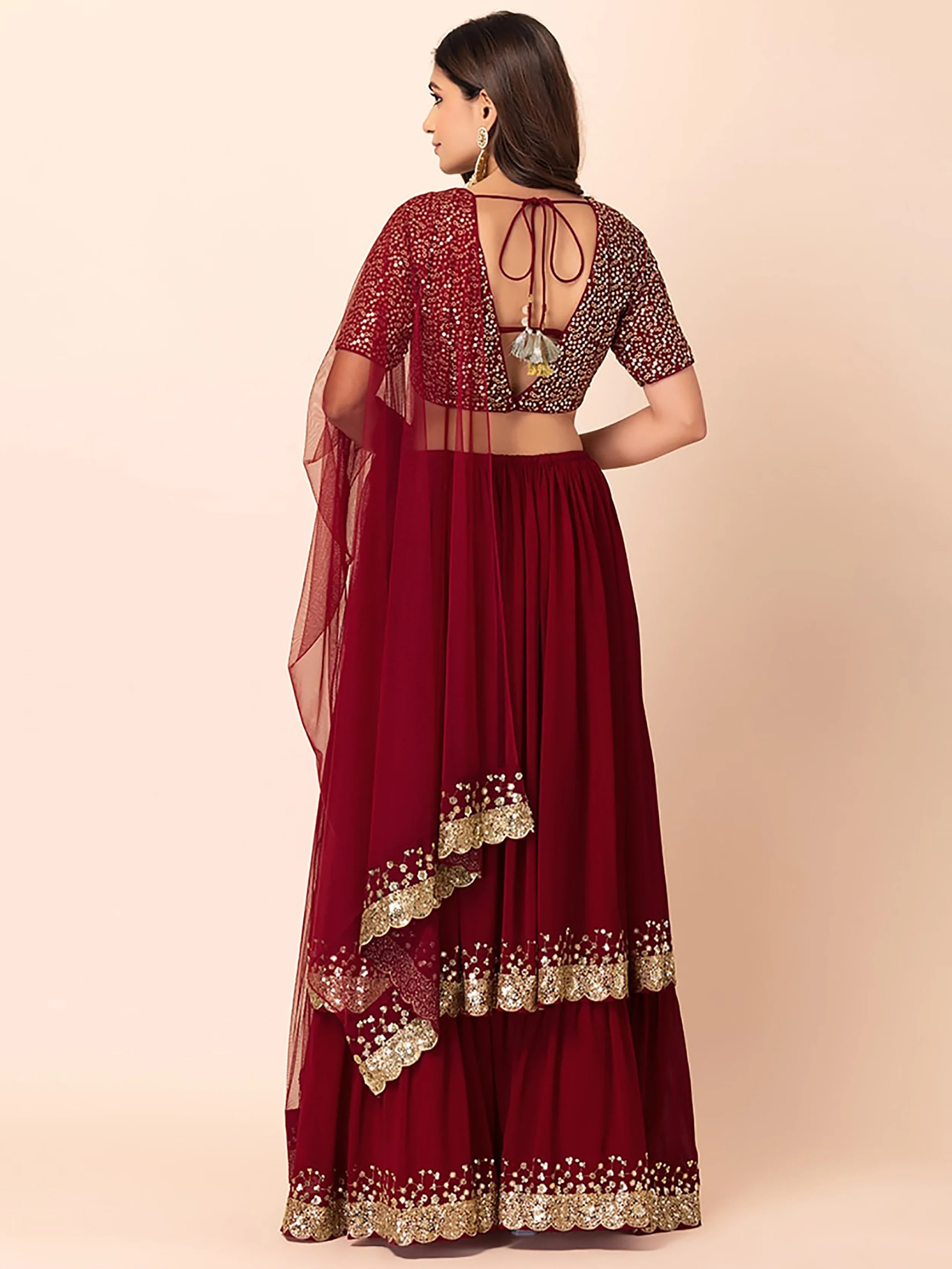 Sequins embroidered georgette lehenga choli for wedding reception and party wear