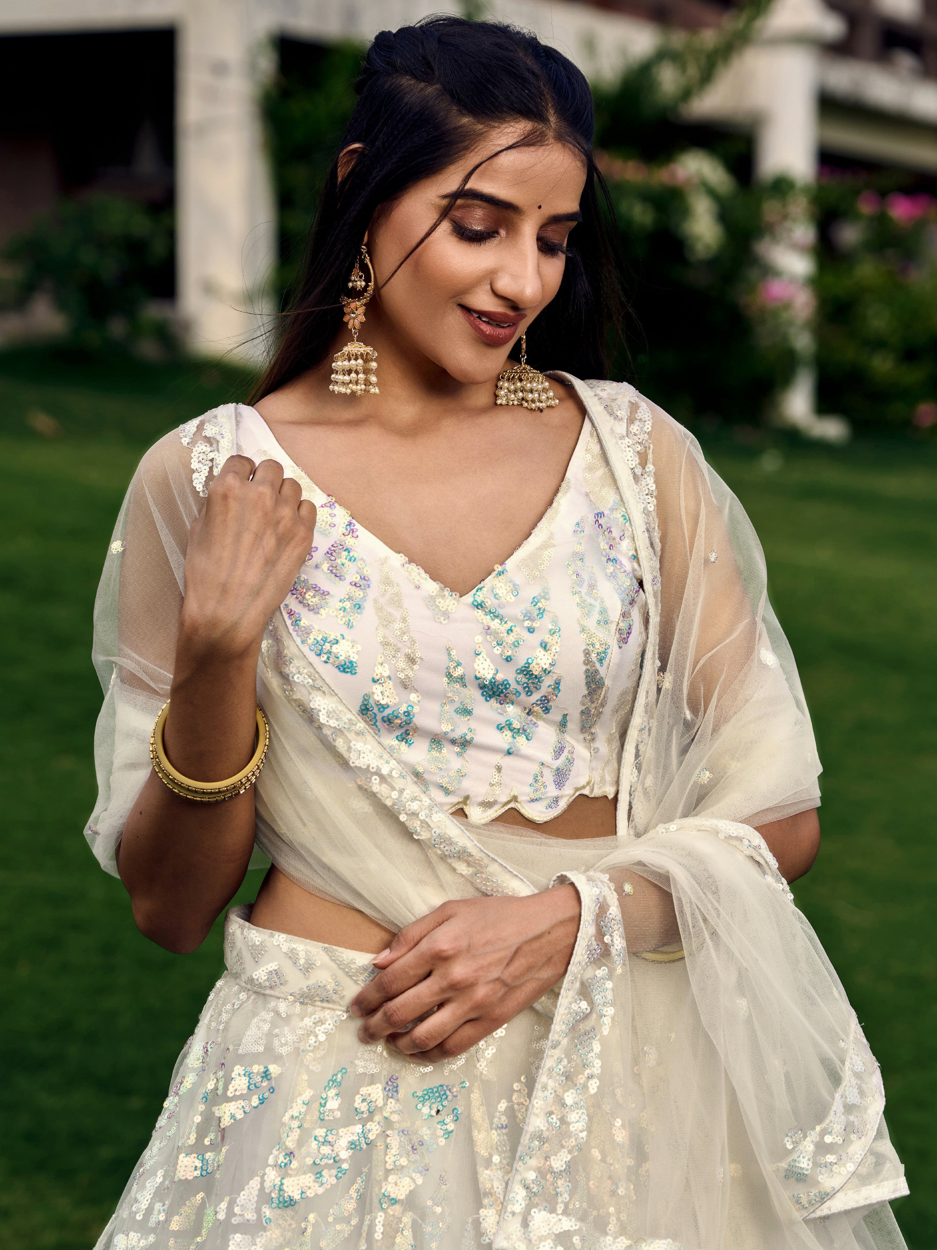 Off White Impressive Sequins Net Function Lehenga Choli with Dupatta for Women