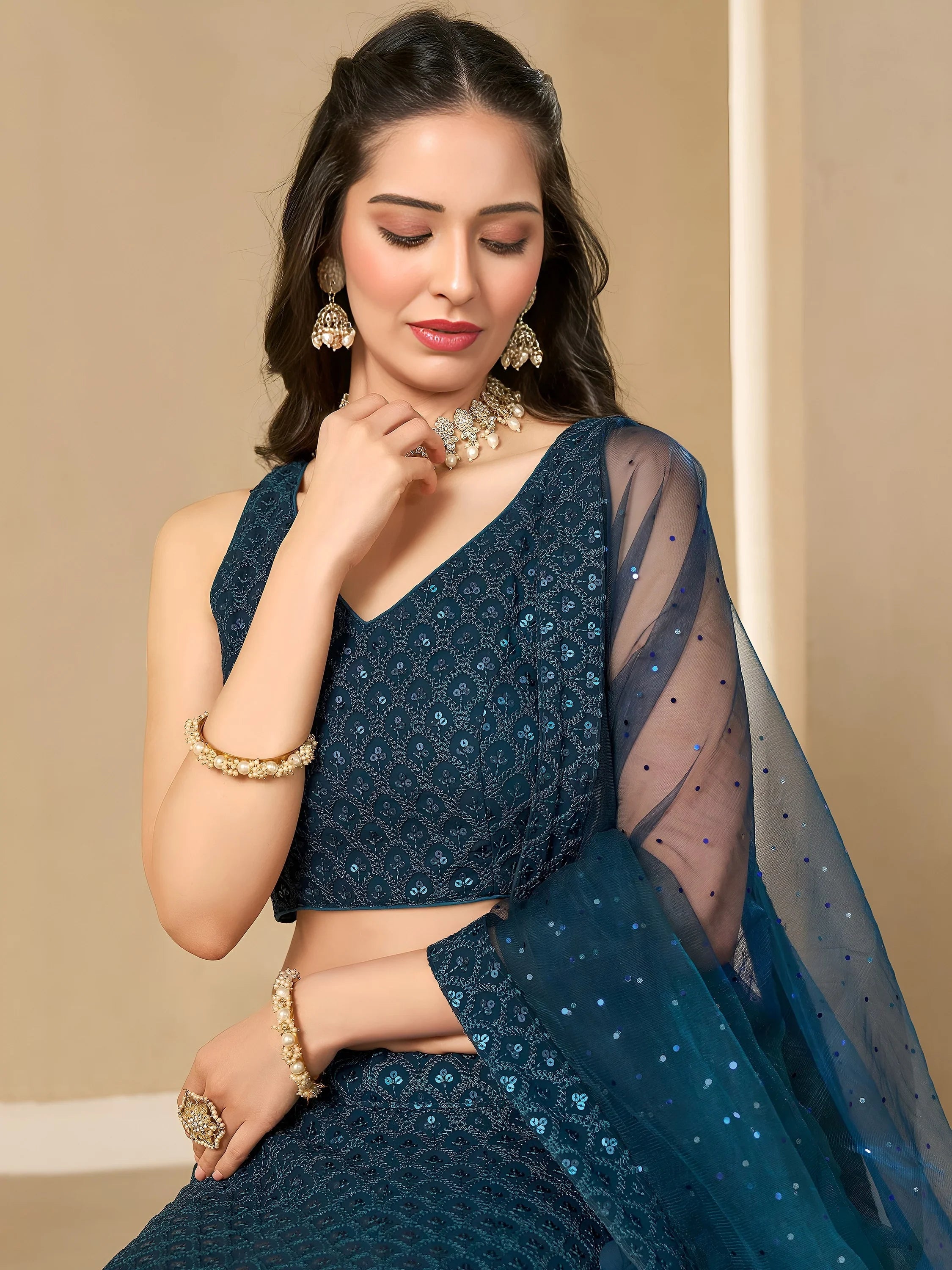 Sequins georgette lehenga choli with thread embroidery for wedding and sangeet occasions