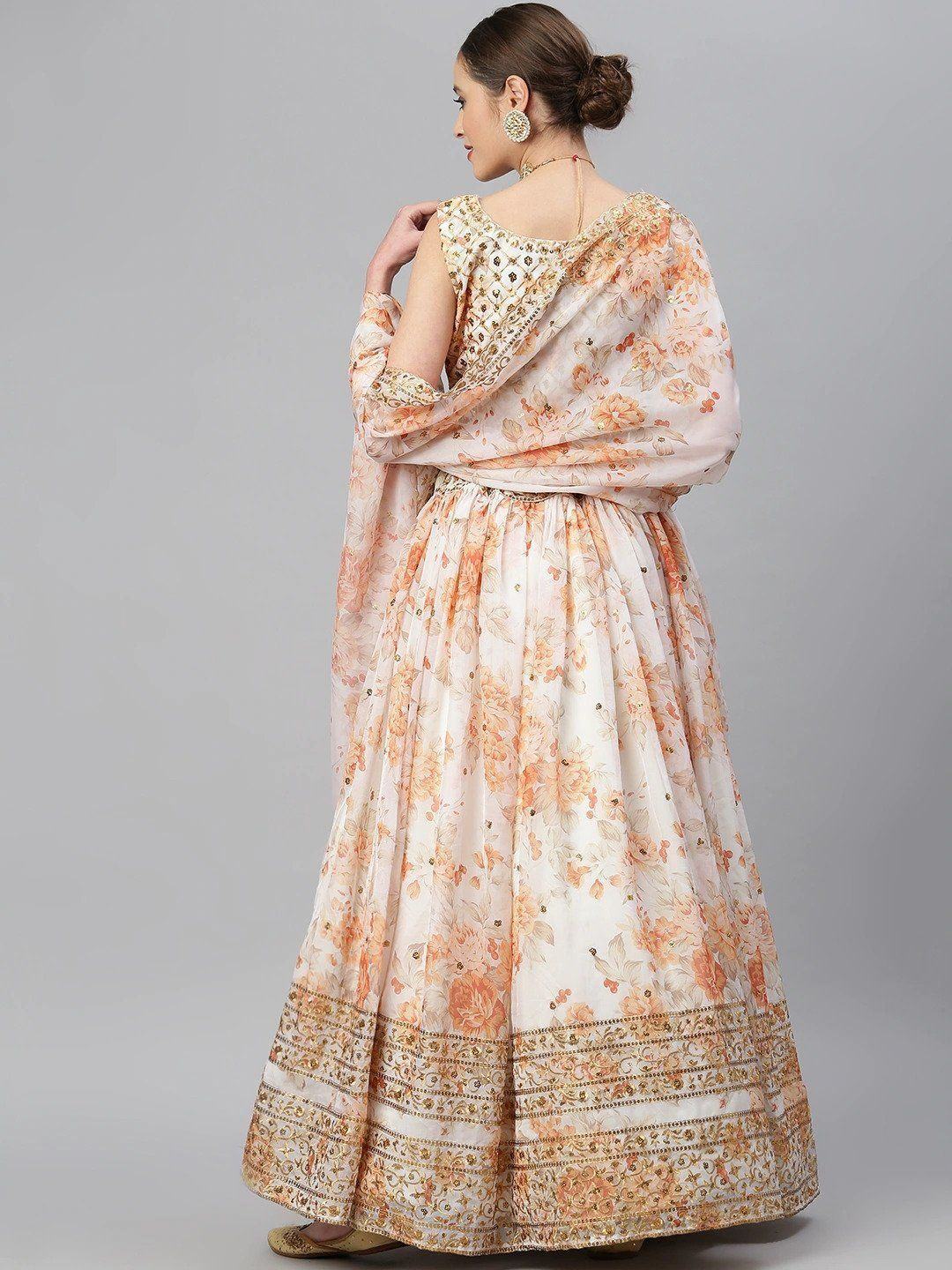 Organza lehenga choli with sequin embellishment and floral embroidery for wedding and festive wear