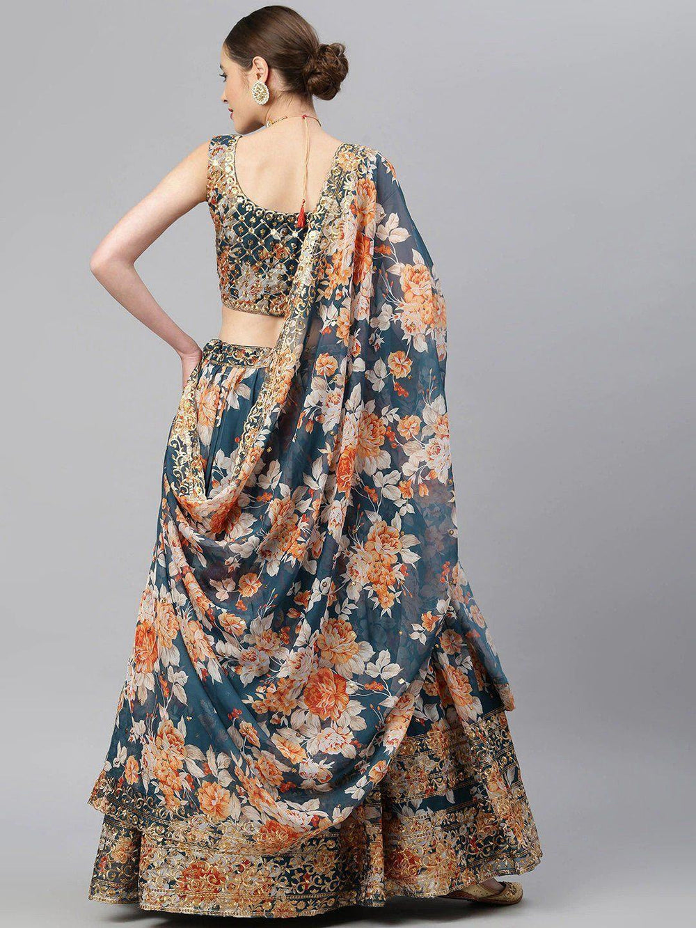 Organza lehenga choli with sequin embellishment and floral embroidery for wedding occasions