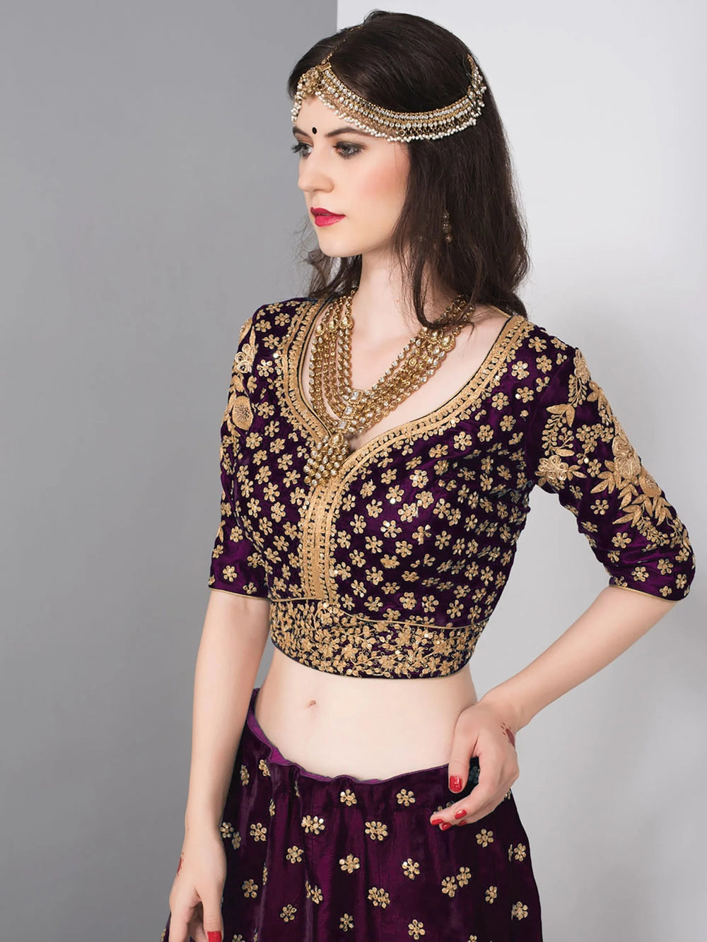 Embroidered velvet lehenga choli with zari sequins work for wedding and bridal occasions