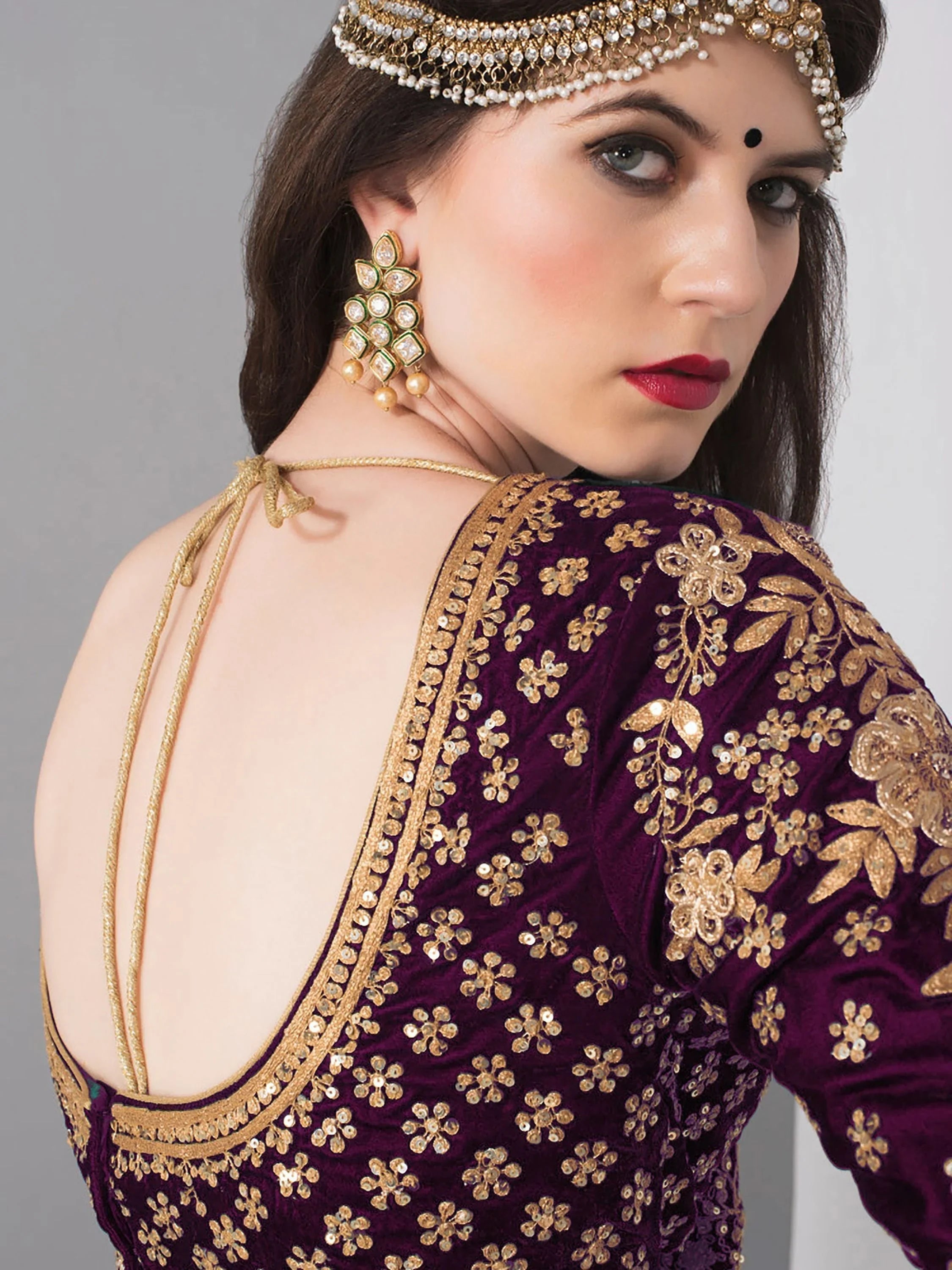 Embroidered velvet lehenga choli with zari sequins work for wedding and bridal occasions