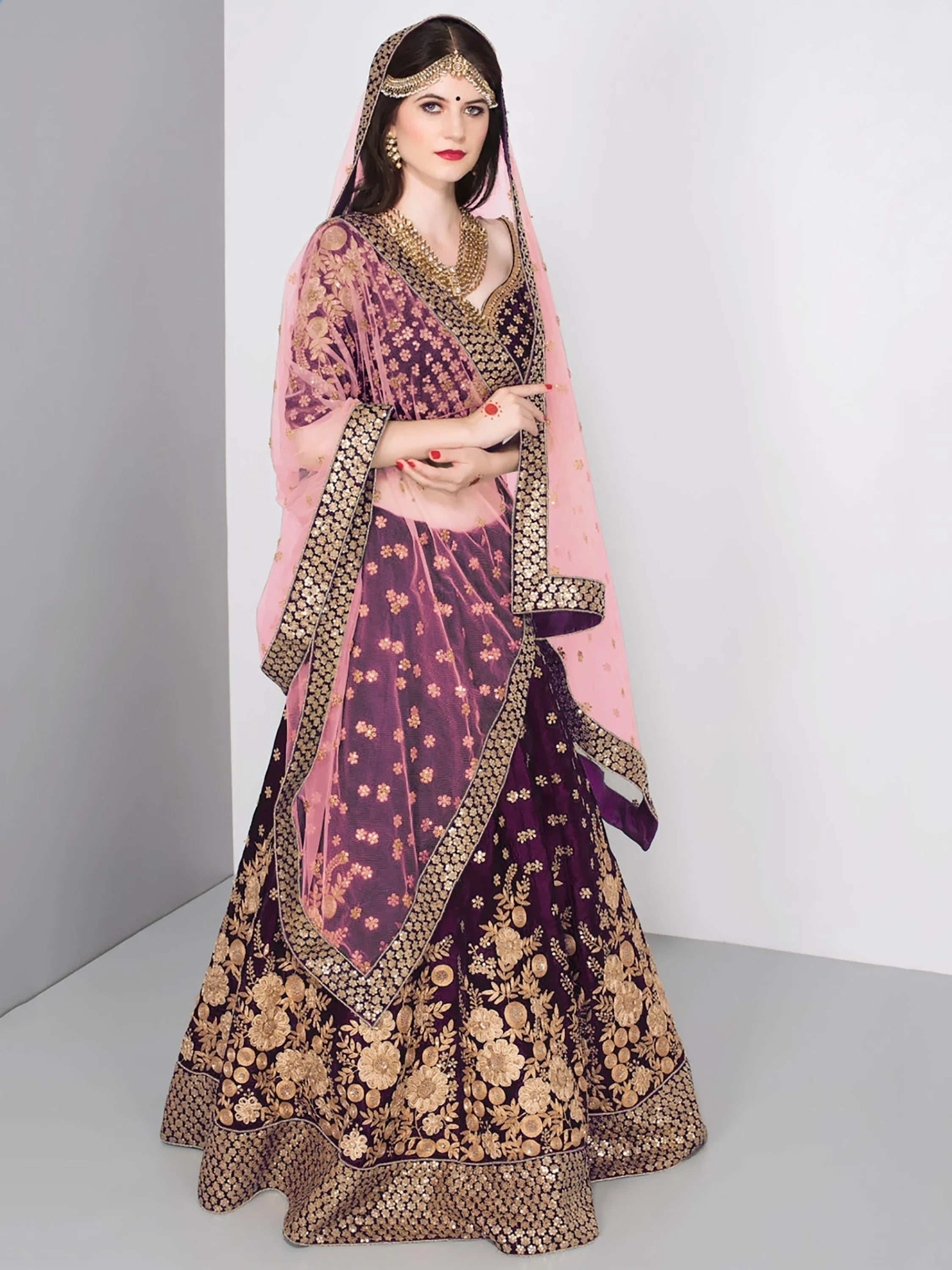 Embroidered velvet lehenga choli with zari sequins work for wedding and bridal occasions