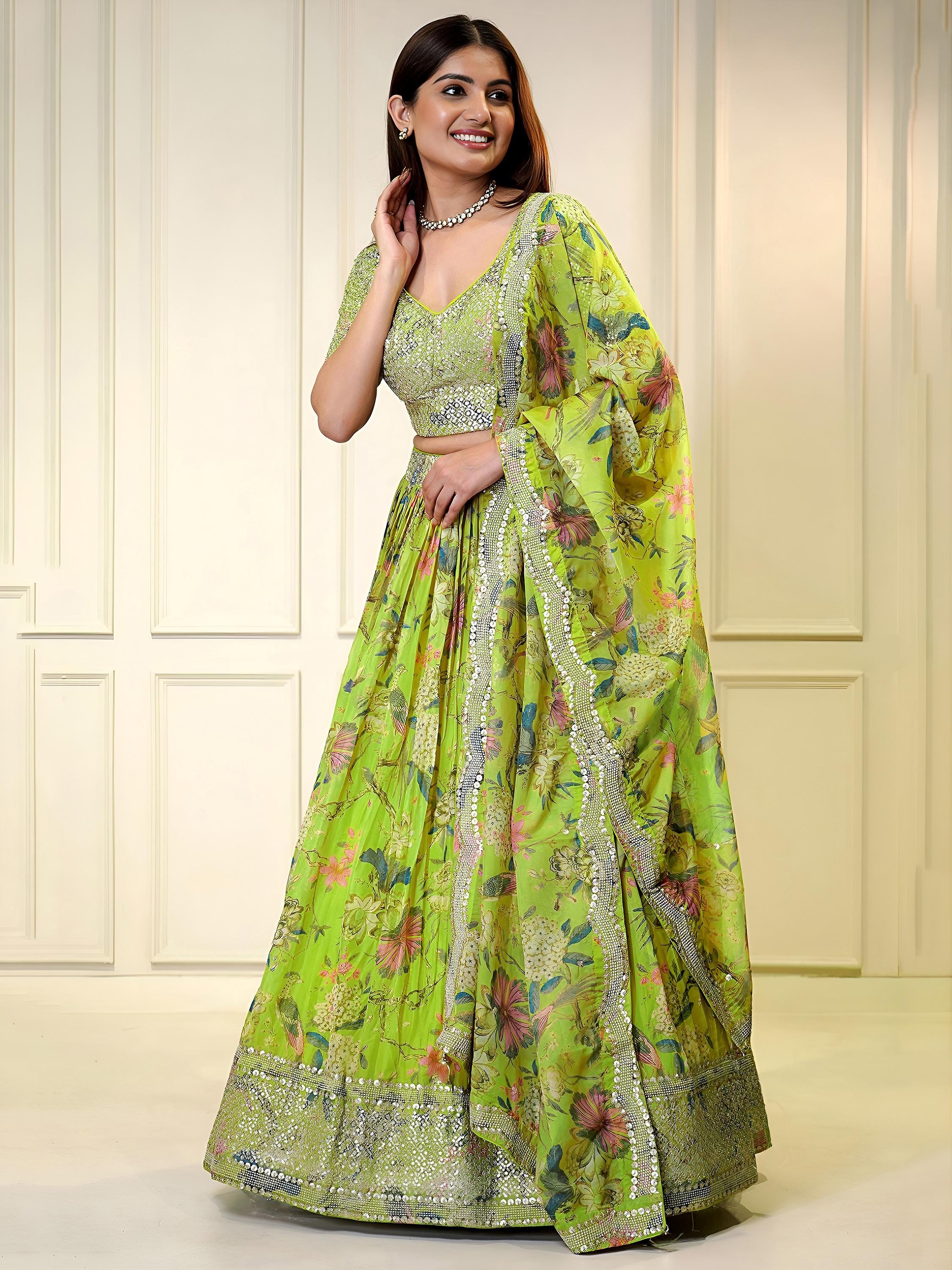 Sequins embellished organza lehenga choli for wedding and party occasions